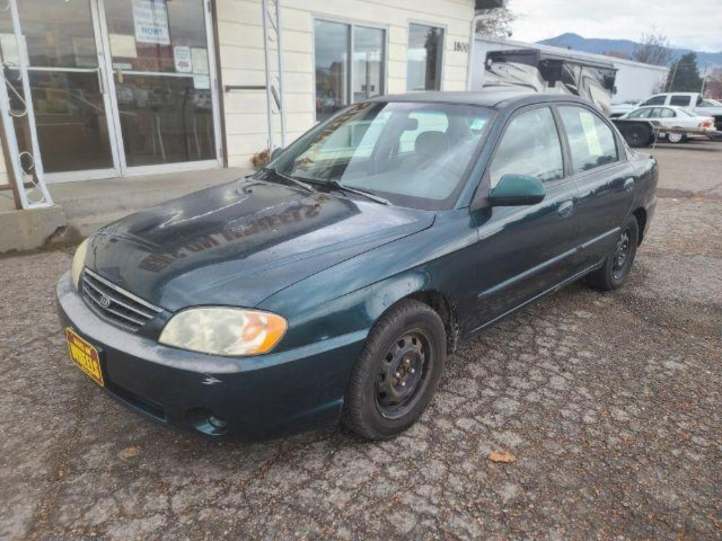 2003 Kia Spectra Base (KNAFB121935) with an 1.8L L4 DOHC 16V engine, located at 1800 West Broadway, Missoula, 59808, (406) 543-1986, 46.881348, -114.023628 - Photo#0