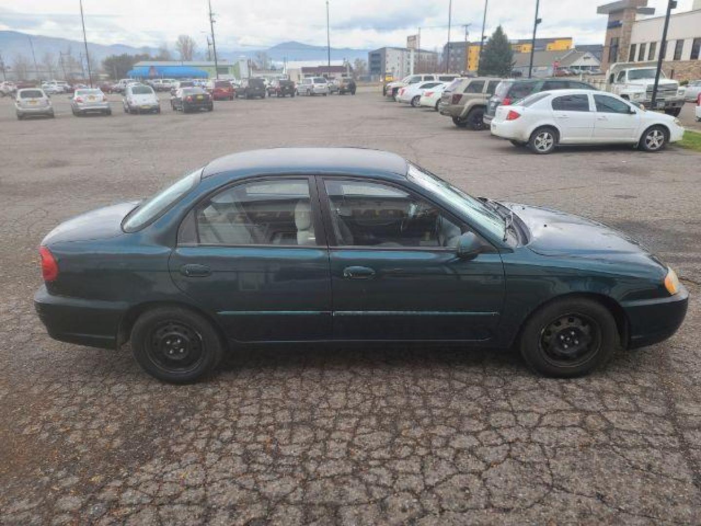 2003 Kia Spectra Base (KNAFB121935) with an 1.8L L4 DOHC 16V engine, located at 1800 West Broadway, Missoula, 59808, (406) 543-1986, 46.881348, -114.023628 - Photo#2