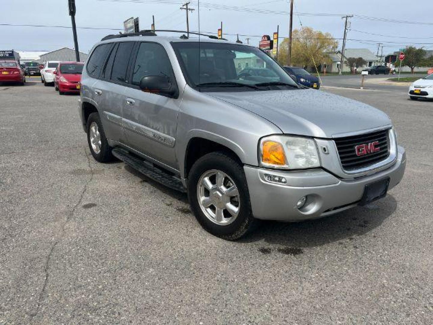 2004 GMC Envoy SLT 4WD (1GKDT13S042) with an 4.2L L6 DOHC 24V engine, 4-Speed Automatic transmission, located at 1821 N Montana Ave., Helena, MT, 59601, (406) 422-1031, 0.000000, 0.000000 - Photo#2