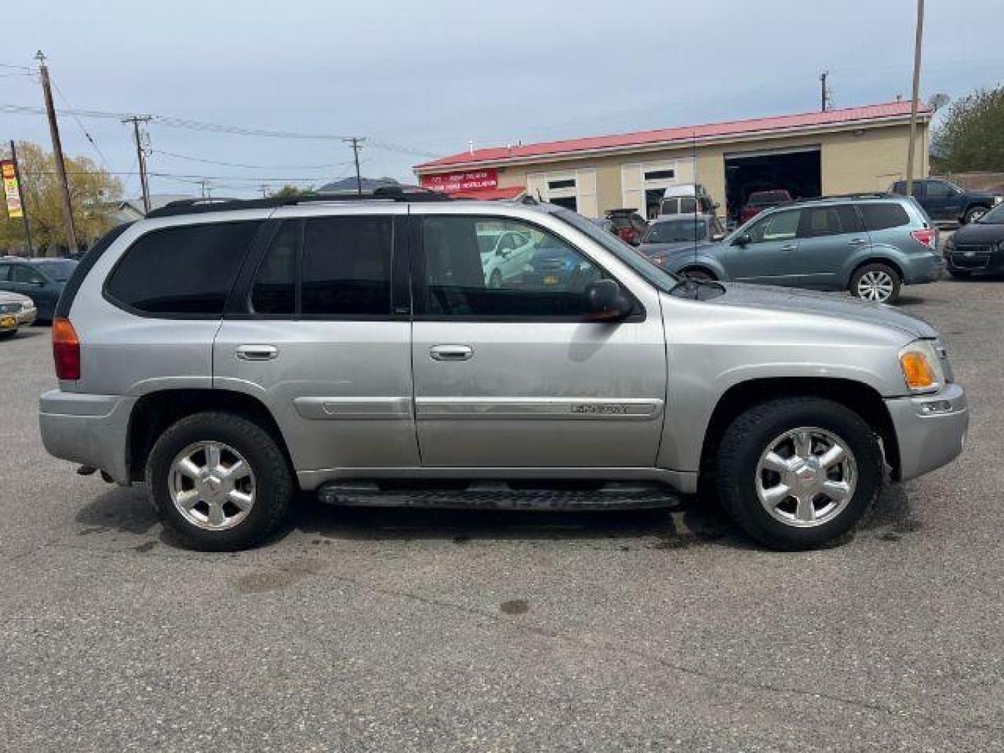 2004 GMC Envoy SLT 4WD (1GKDT13S042) with an 4.2L L6 DOHC 24V engine, 4-Speed Automatic transmission, located at 1821 N Montana Ave., Helena, MT, 59601, (406) 422-1031, 0.000000, 0.000000 - Photo#3