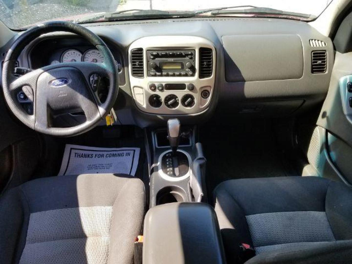 2005 Red Fire Metallic Ford Escape XLT 4WD (1FMYU93125K) with an 3.0L V6 DOHC 24V engine, 4-Speed Automatic transmission, located at 4801 10th Ave S,, Great Falls, MT, 59405, 0.000000, 0.000000 - Photo#11