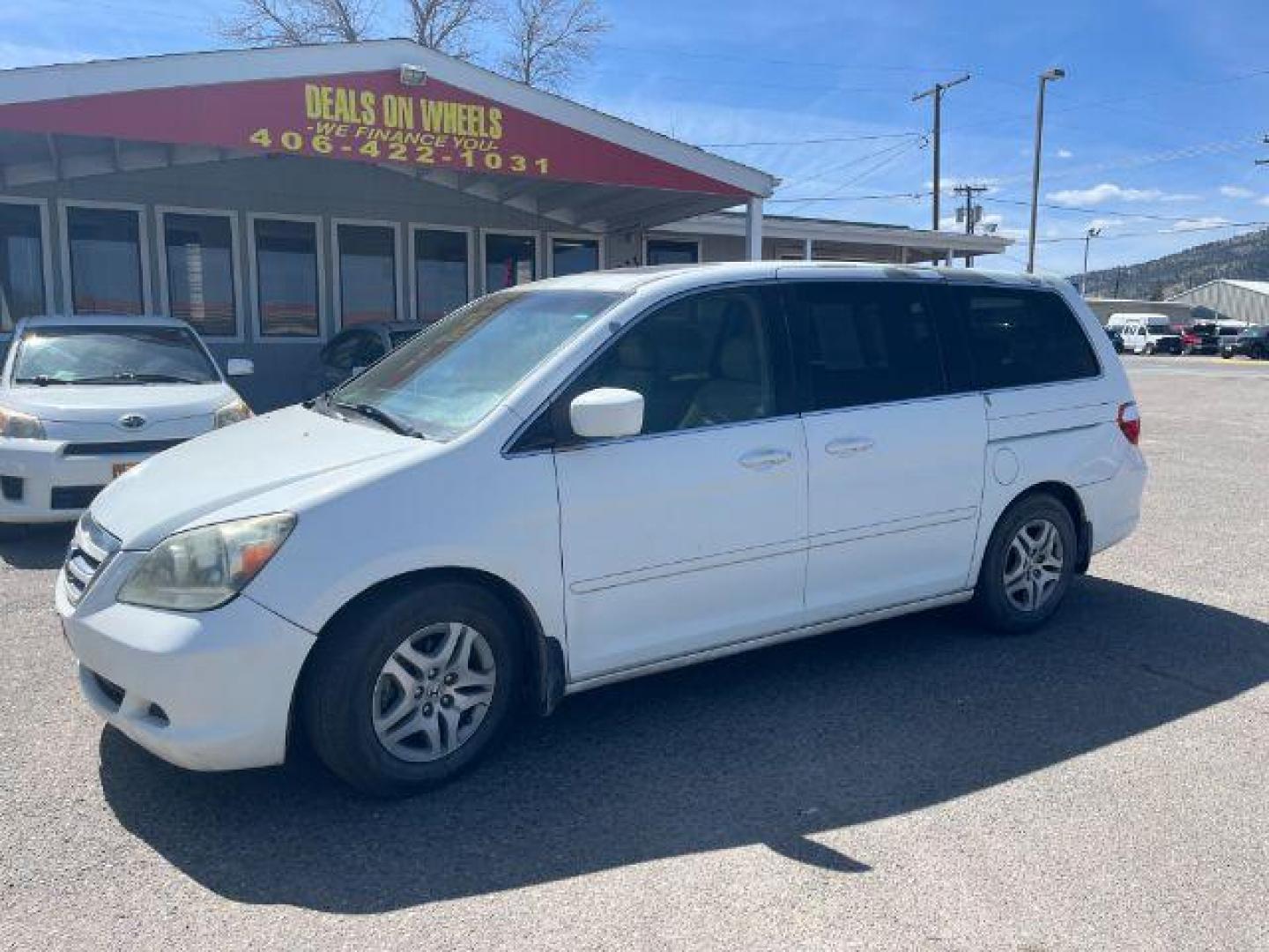 2005 Honda Odyssey EX w/ Leather DVD (5FNRL38745B) with an 3.5L V6 SOHC 24V engine, 5-Speed Automatic transmission, located at 1821 N Montana Ave., Helena, MT, 59601, (406) 422-1031, 0.000000, 0.000000 - Photo#0