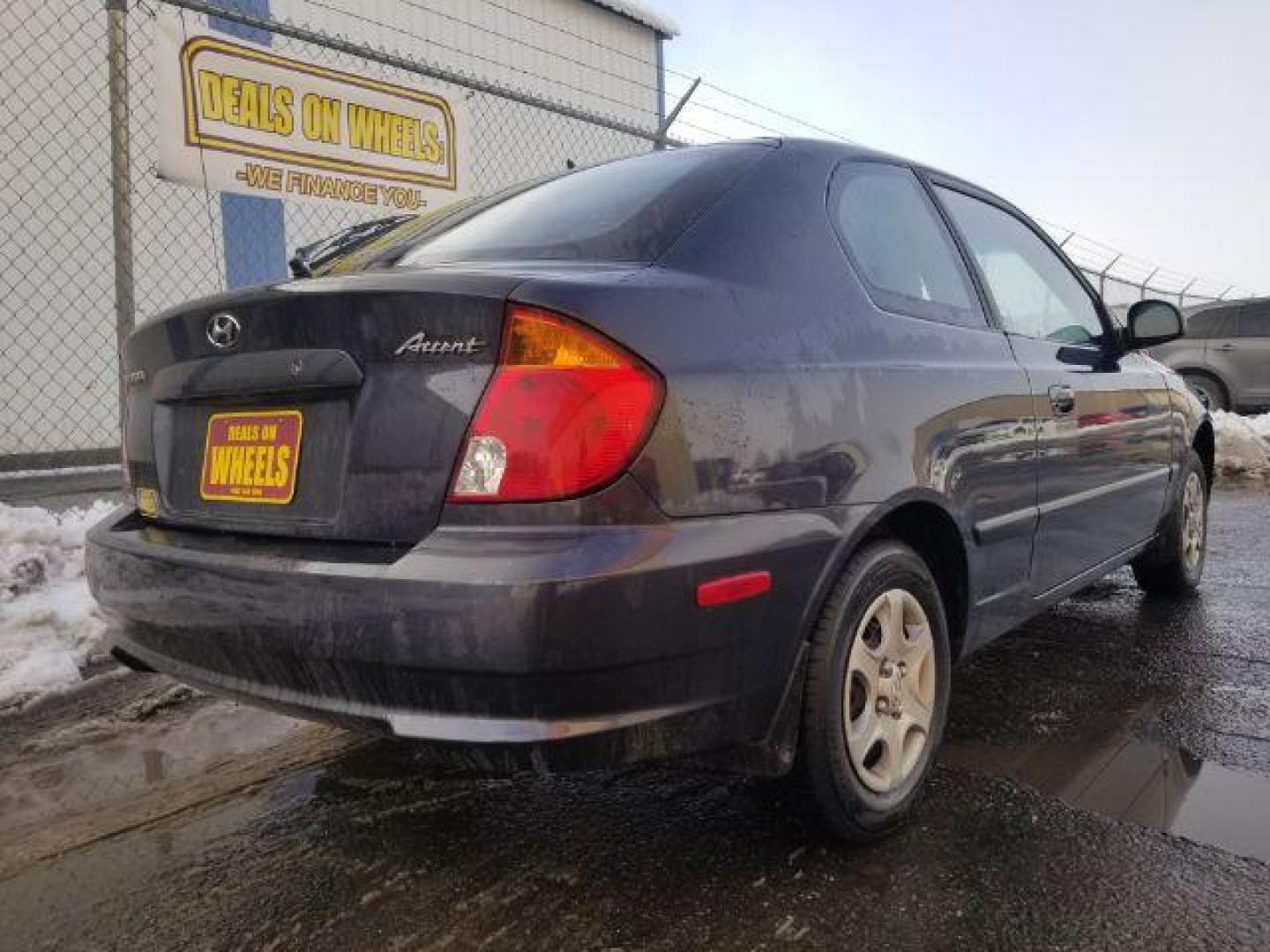 2005 Hyundai Accent GLS 3-Door (KMHCG35CX5U) with an 1.6L L4 DOHC 16V engine, located at 4801 10th Ave S,, Great Falls, MT, 59405, 0.000000, 0.000000 - Photo#4