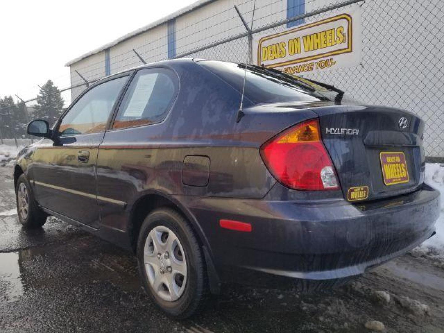 2005 Hyundai Accent GLS 3-Door (KMHCG35CX5U) with an 1.6L L4 DOHC 16V engine, located at 4801 10th Ave S,, Great Falls, MT, 59405, 0.000000, 0.000000 - Photo#5