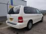 2005 Clear White /Beige Cloth Interior Kia Sedona LX (KNDUP132856) with an 3.5L V6 DOHC 16V engine, 5-Speed Automatic transmission, located at 4801 10th Ave S,, Great Falls, MT, 59405, 0.000000, 0.000000 - Photo#4