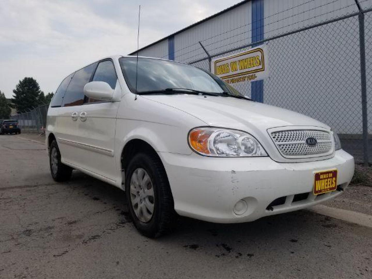 2005 Clear White /Beige Cloth Interior Kia Sedona LX (KNDUP132856) with an 3.5L V6 DOHC 16V engine, 5-Speed Automatic transmission, located at 4801 10th Ave S,, Great Falls, MT, 59405, 0.000000, 0.000000 - Photo#6