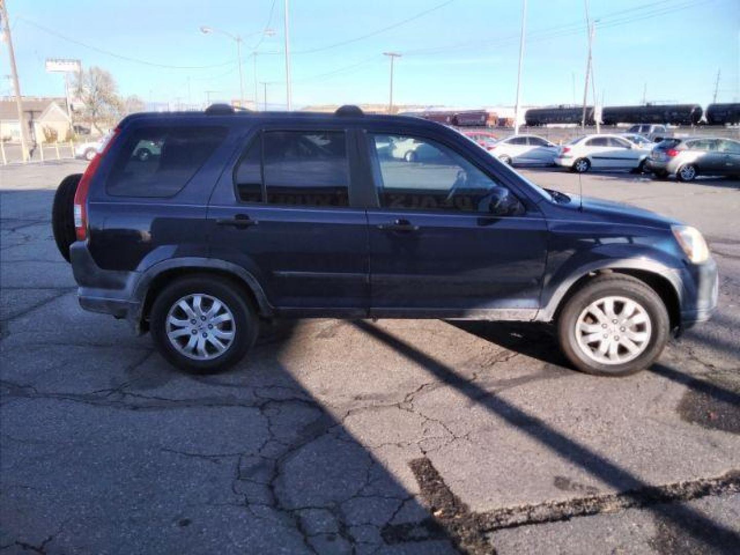 2006 Honda CR-V EX 4WD AT (JHLRD78806C) with an 2.4L L4 DOHC 16V engine, 5-Speed Automatic transmission, located at 4047 Montana Ave., Billings, MT, 59101, 45.770847, -108.529800 - Photo#4