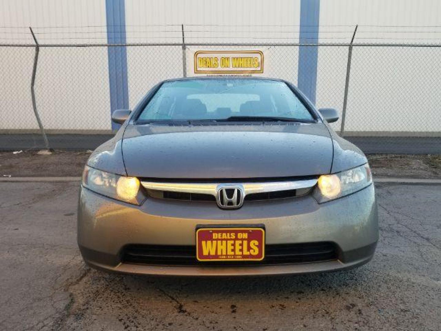 2006 Honda Civic EX Sedan AT (1HGFA16806L) with an 1.8L L4 SOHC 16V engine, 5-Speed Automatic transmission, located at 4047 Montana Ave., Billings, MT, 59101, 45.770847, -108.529800 - Photo#1