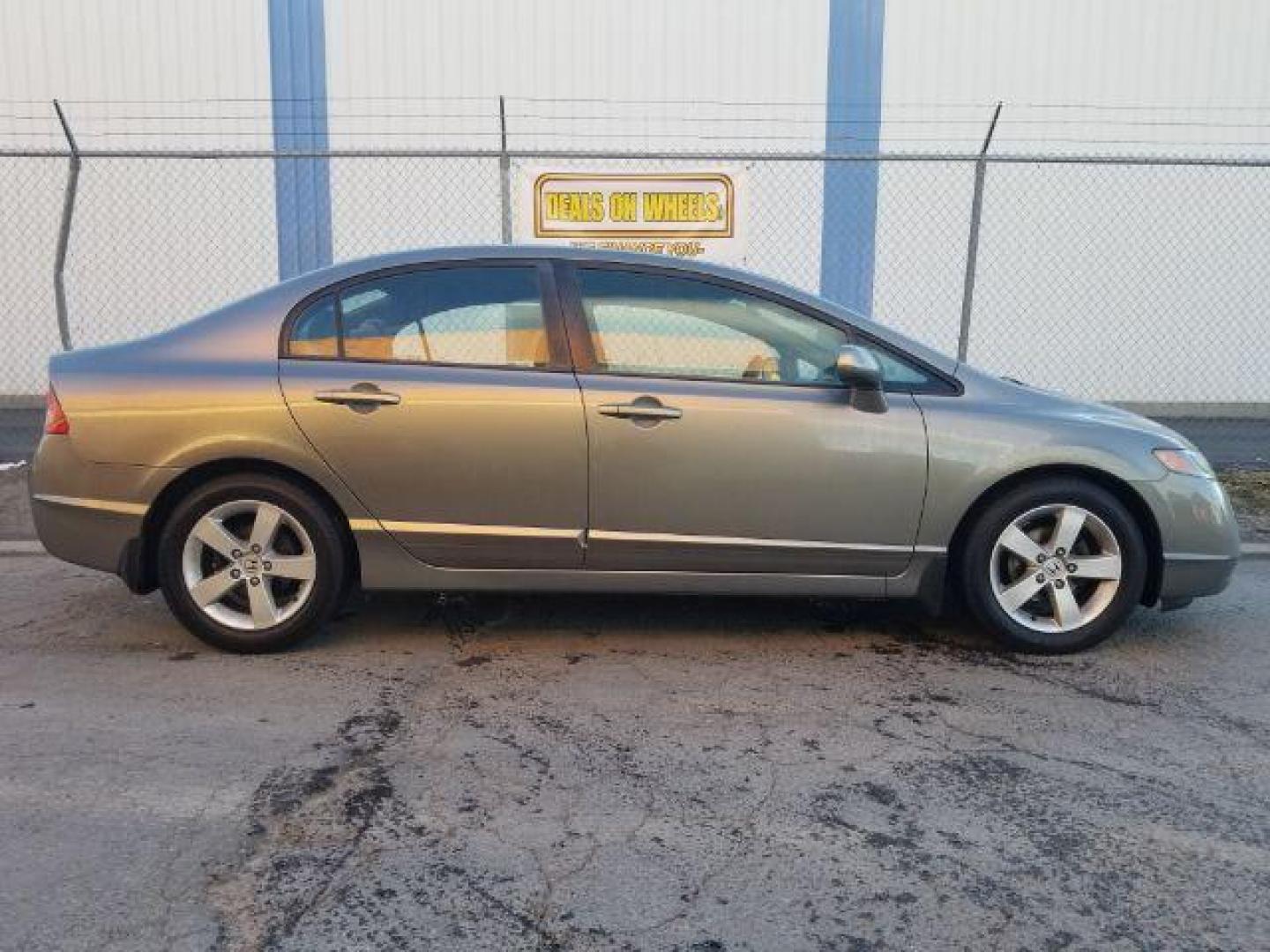 2006 Honda Civic EX Sedan AT (1HGFA16806L) with an 1.8L L4 SOHC 16V engine, 5-Speed Automatic transmission, located at 4047 Montana Ave., Billings, MT, 59101, 45.770847, -108.529800 - Photo#3