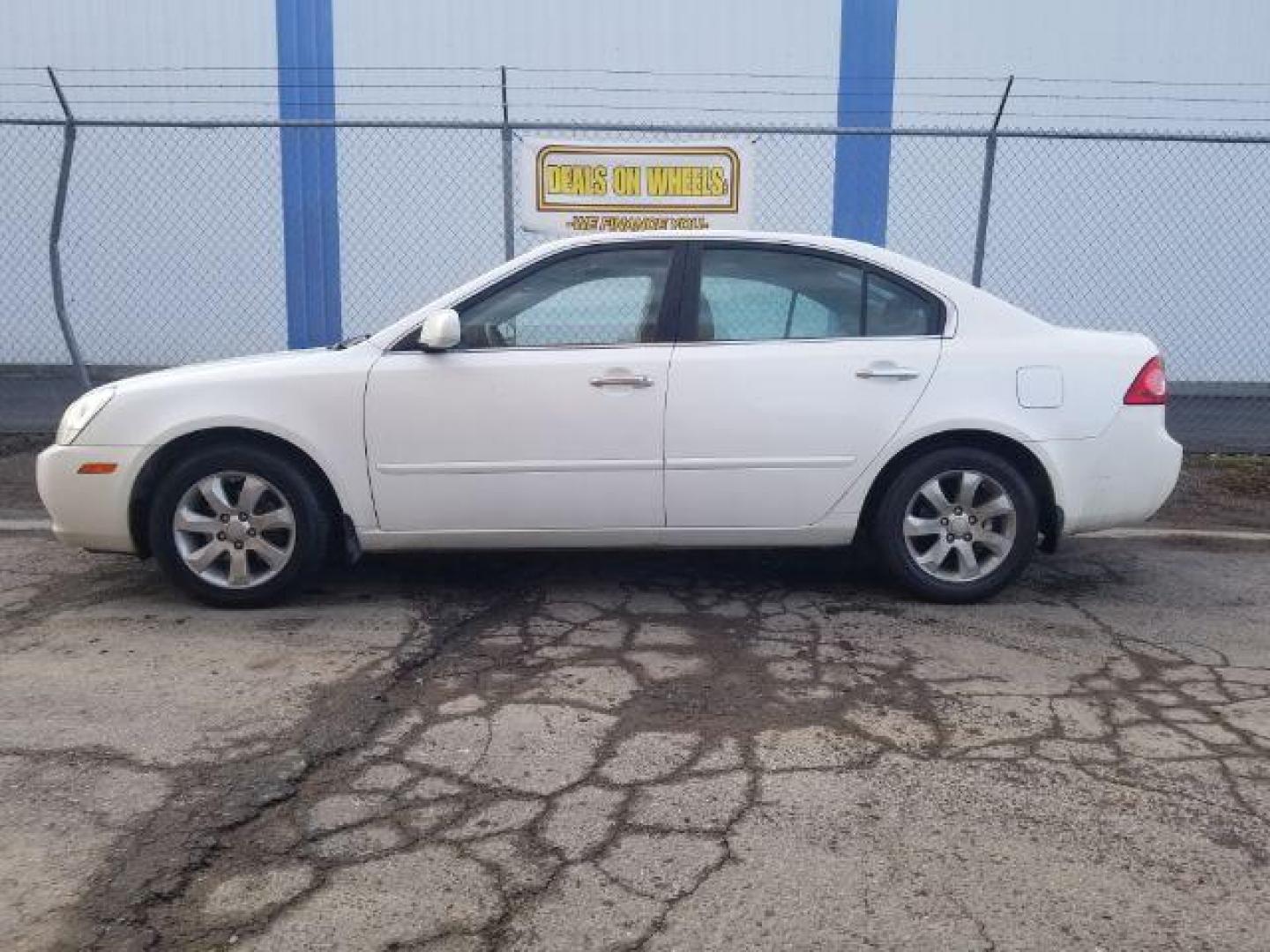 2006 Kia Optima EX V6 (KNAGE124965) with an 2.7L V6 24V DOHC engine, 4-Speed Automatic transmission, located at 601 E. Idaho St., Kalispell, MT, 59901, 0.000000, 0.000000 - Photo#6