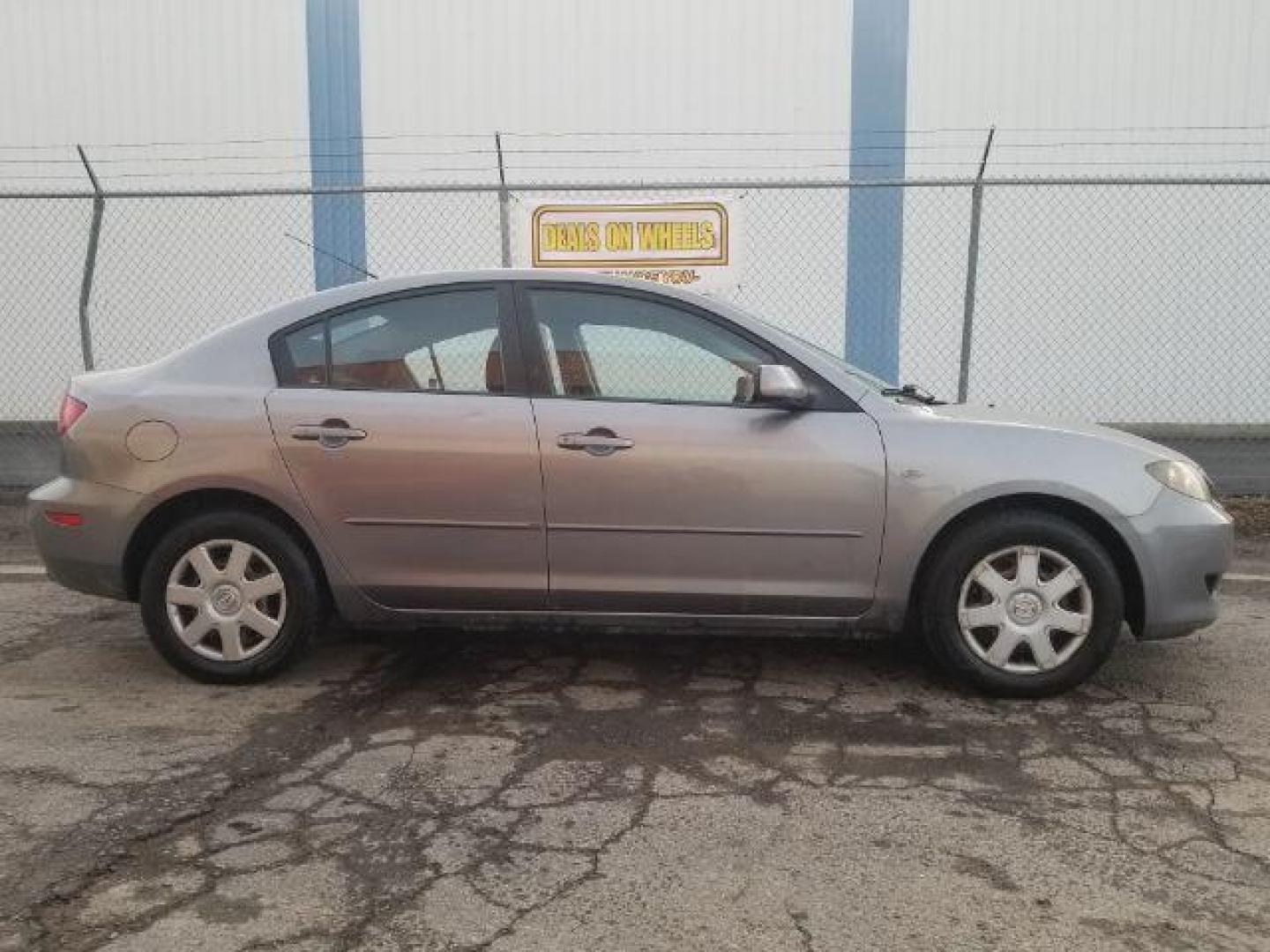 2006 Mazda MAZDA3 i 4-door (JM1BK12FX61) with an 2.0L L4 DOHC 16V engine, located at 4047 Montana Ave., Billings, MT, 59101, 45.770847, -108.529800 - Photo#3