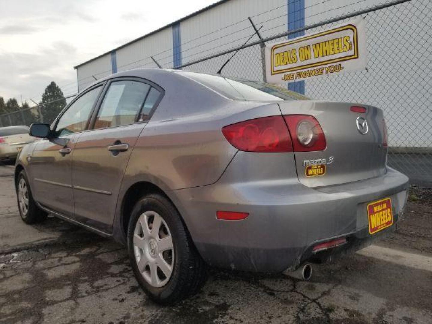 2006 Mazda MAZDA3 i 4-door (JM1BK12FX61) with an 2.0L L4 DOHC 16V engine, located at 4047 Montana Ave., Billings, MT, 59101, 45.770847, -108.529800 - Photo#5