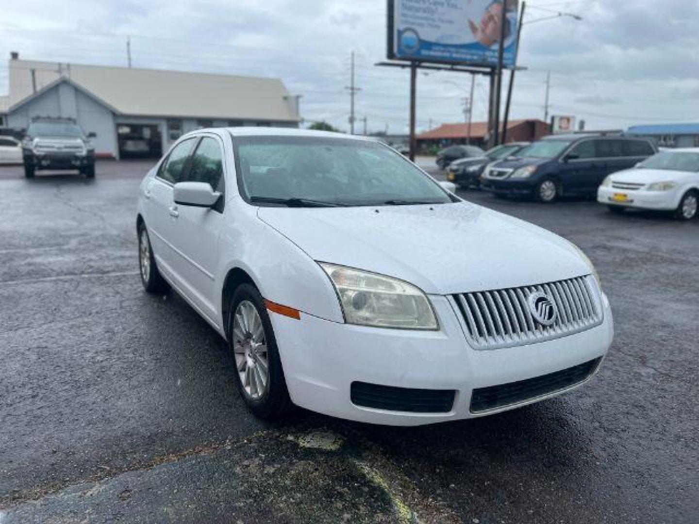 2006 Mercury Milan V6 Premier (3MEFM08106R) with an 3.0L V6 DOHC 24V engine, 6-Speed Automatic transmission, located at 4047 Montana Ave., Billings, MT, 59101, 45.770847, -108.529800 - Photo#6