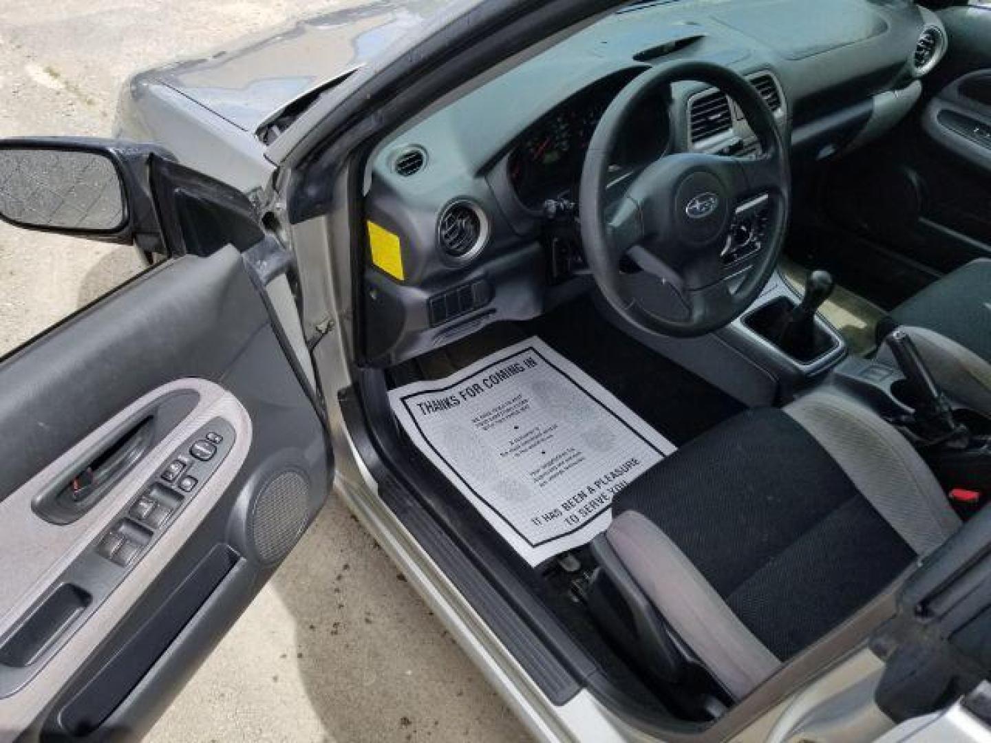 2006 Subaru Impreza SEDAN 4-DR (JF1GD67676G) with an 2.5L H4 SOHC 16V engine, 5-Speed Manual transmission, located at 1800 West Broadway, Missoula, 59808, (406) 543-1986, 46.881348, -114.023628 - Photo#7