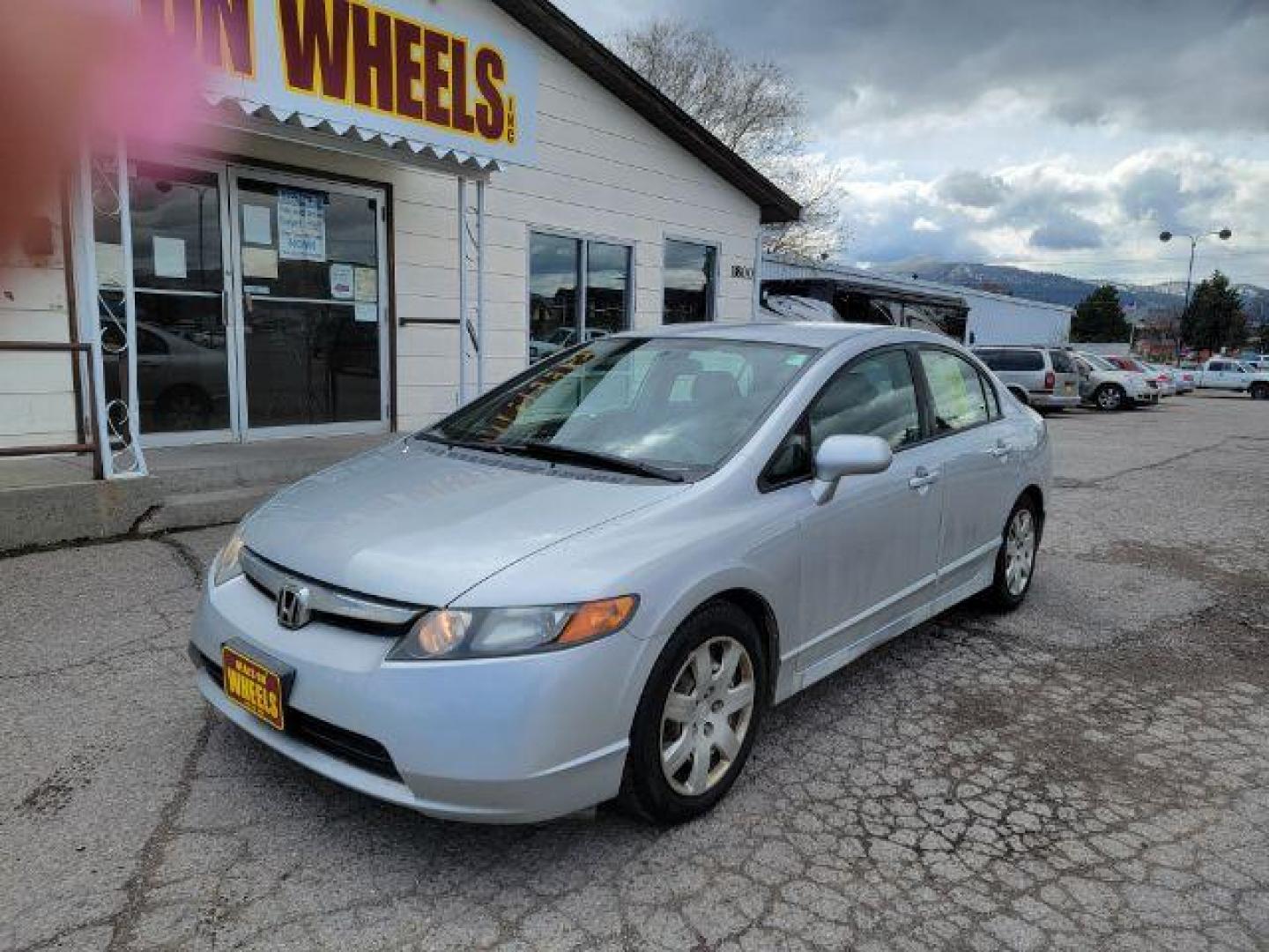 2007 Honda Civic LX Sedan AT (1HGFA16527L) with an 1.8L L4 SOHC 16V engine, 5-Speed Automatic transmission, located at 1800 West Broadway, Missoula, 59808, (406) 543-1986, 46.881348, -114.023628 - Photo#1