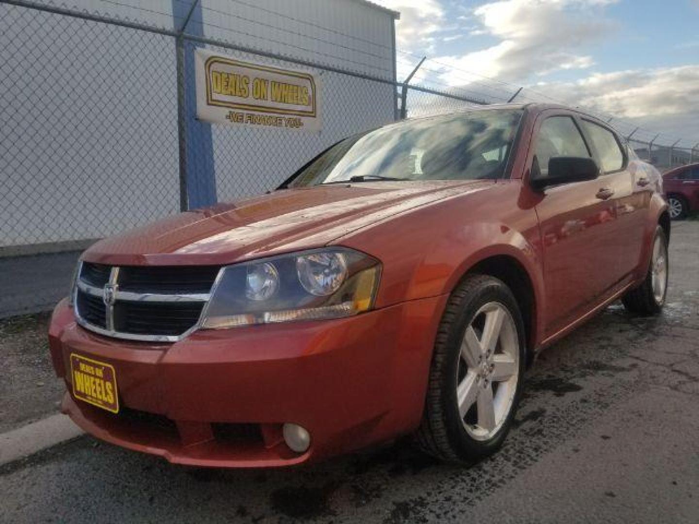 2008 Sunburst Orange Pear Dodge Avenger SXT (1B3LC56R08N) with an 2.7L V6 DOHC 24V FFV engine, 4-Speed Automatic transmission, located at 1800 West Broadway, Missoula, 59808, (406) 543-1986, 46.881348, -114.023628 - Photo#0