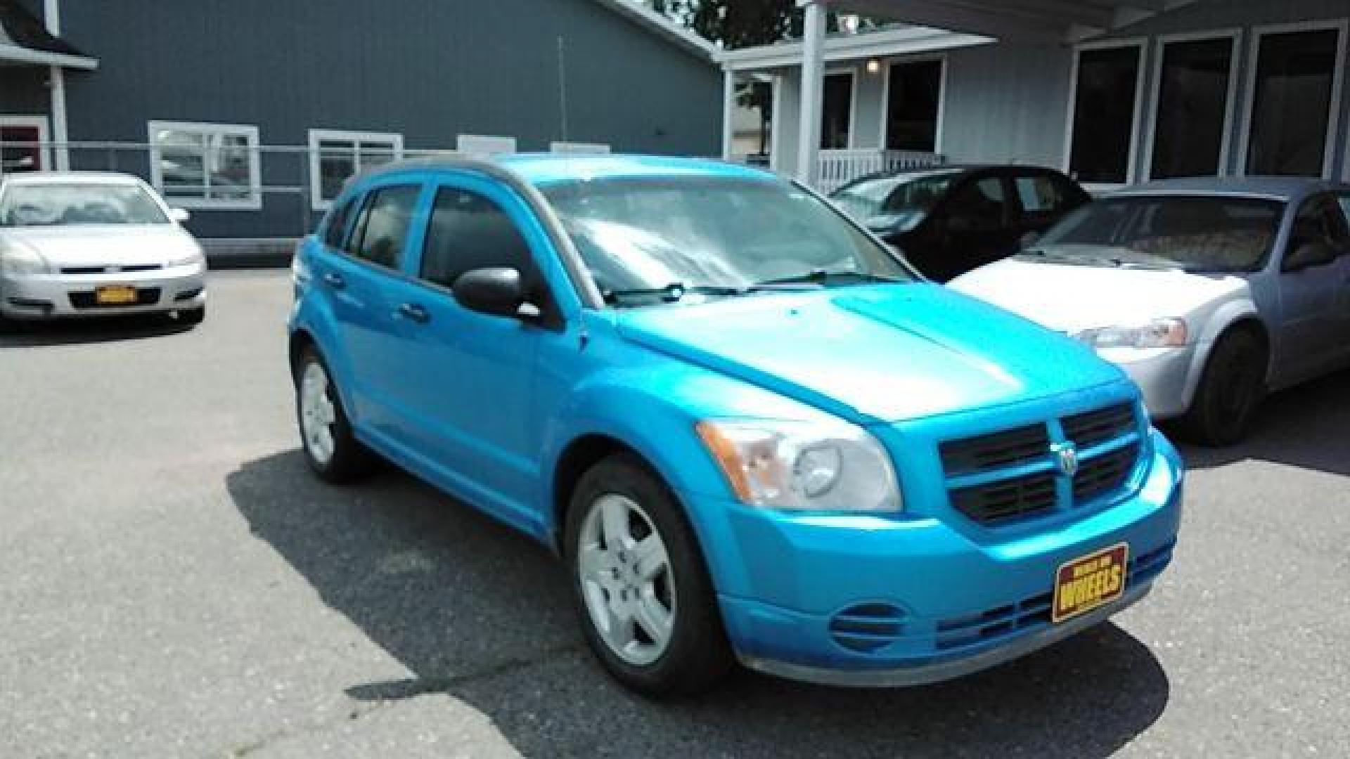 2008 Steel Blue Metallic /Dark Slate Gray Clot Dodge Caliber SE (1B3HB28C08D) with an 1.8L L4 DOHC 16V engine, located at 4047 Montana Ave., Billings, MT, 59101, 45.770847, -108.529800 - Photo#2