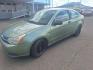 2008 GREEN FORD FOCUS green (1FAHP32N58W) with an 2.0L 16V engine, Manual transmission, located at 1821 N Montana Ave., Helena, MT, 59601, (406) 422-1031, 0.000000, 0.000000 - Photo#0