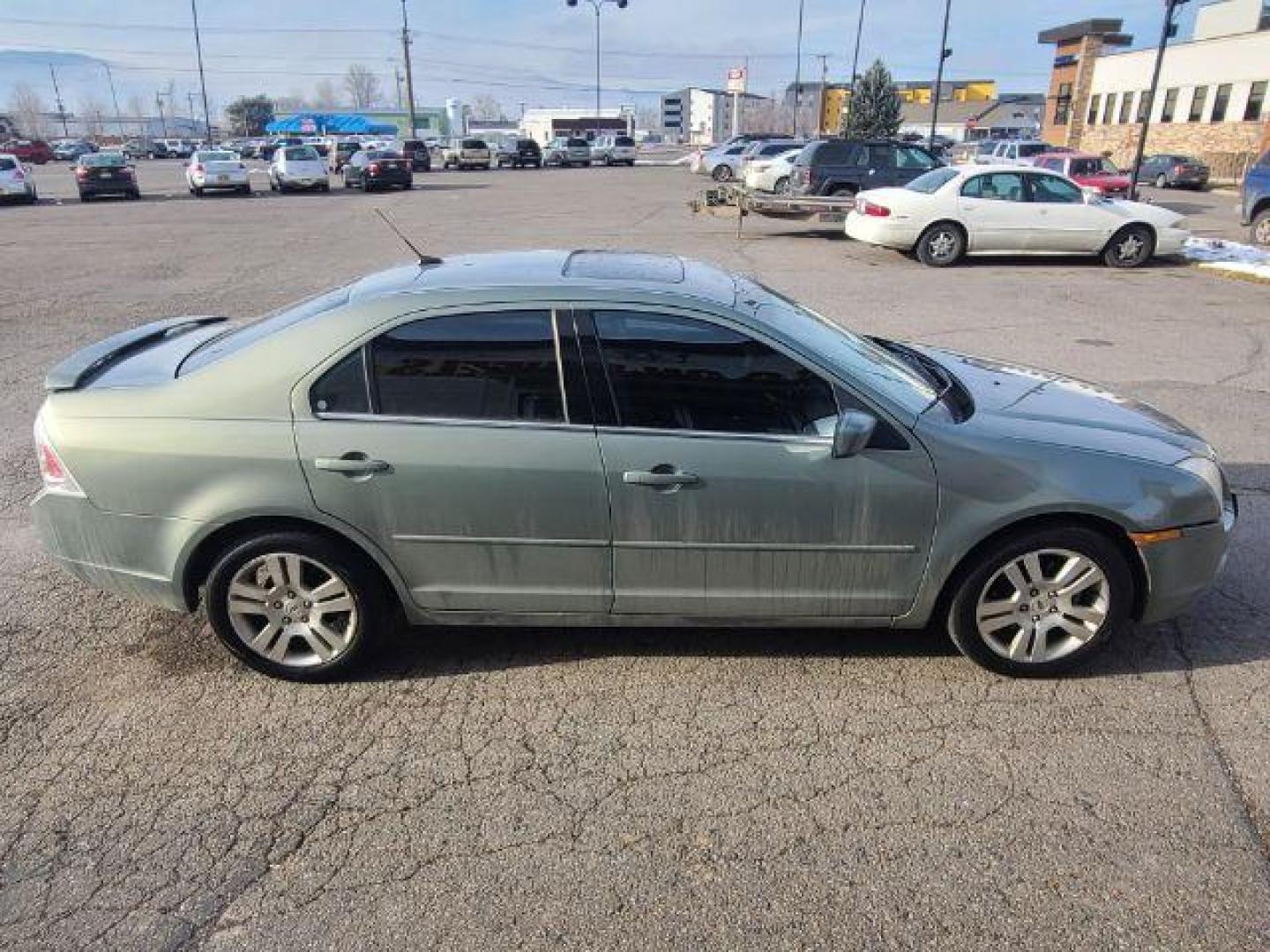 2008 Ford Fusion V6 SEL AWD (3FAHP02108R) with an 3.0L V6 DOHC 24V engine, located at 1800 West Broadway, Missoula, 59808, (406) 543-1986, 46.881348, -114.023628 - Photo#2