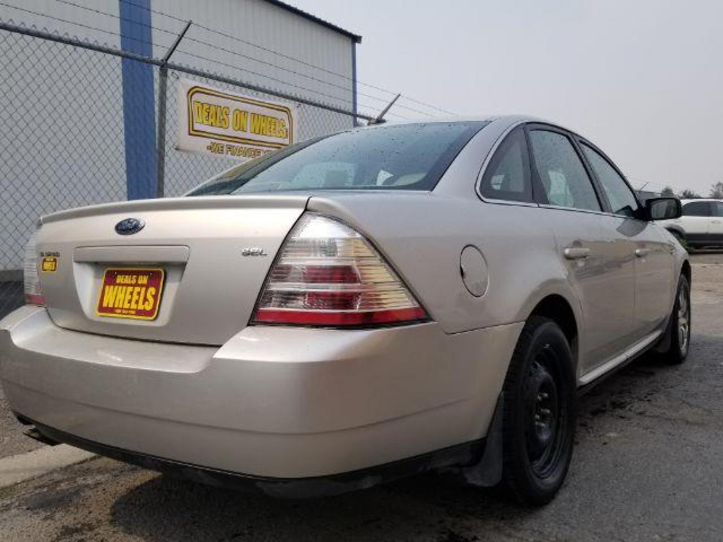 2008 Silver Birch Metalli Ford Taurus SEL (1FAHP24W08G) with an 3.5L V6 DOHC 24V engine, 6-Speed Automatic transmission, located at 4801 10th Ave S,, Great Falls, MT, 59405, 0.000000, 0.000000 - Photo#4