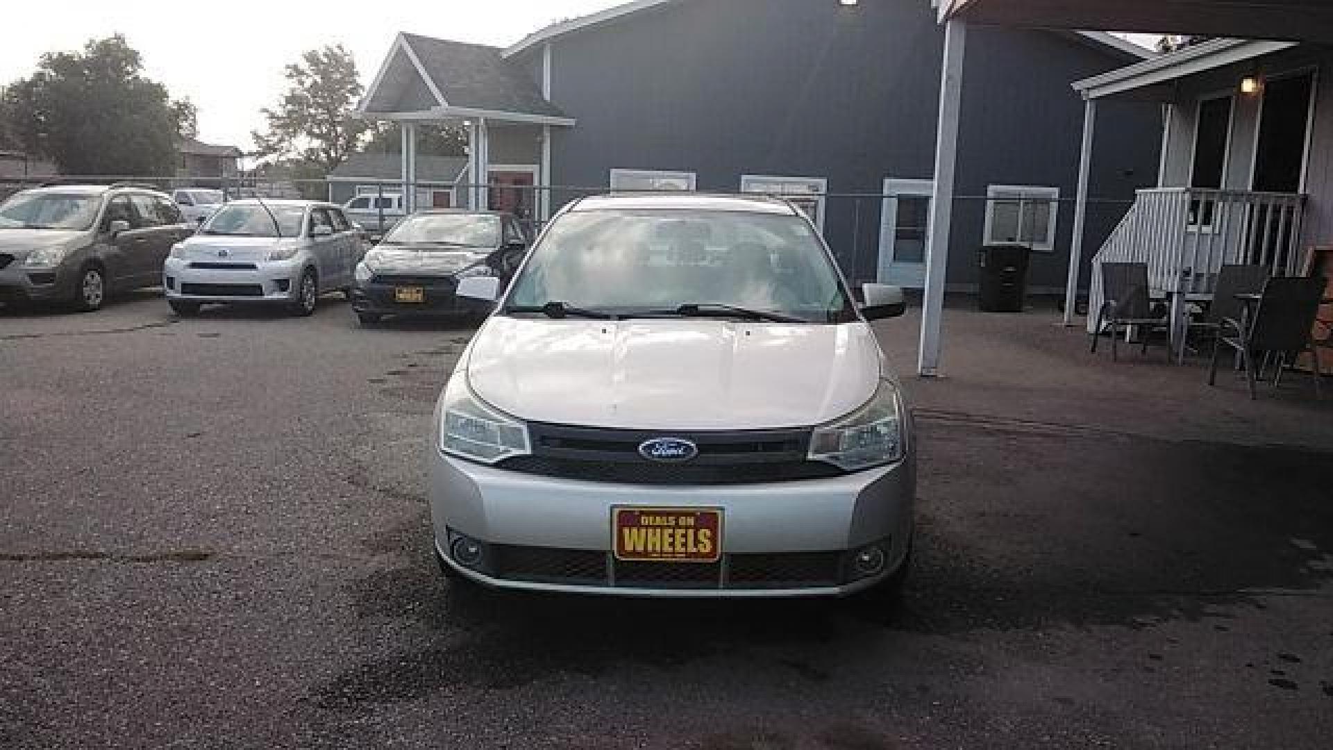 2009 Brilliant Silver Met Ford Focus SES Sedan (1FAHP36N89W) with an 2.0L L4 DOHC 16V engine, located at 1821 N Montana Ave., Helena, MT, 59601, (406) 422-1031, 0.000000, 0.000000 - Photo#1