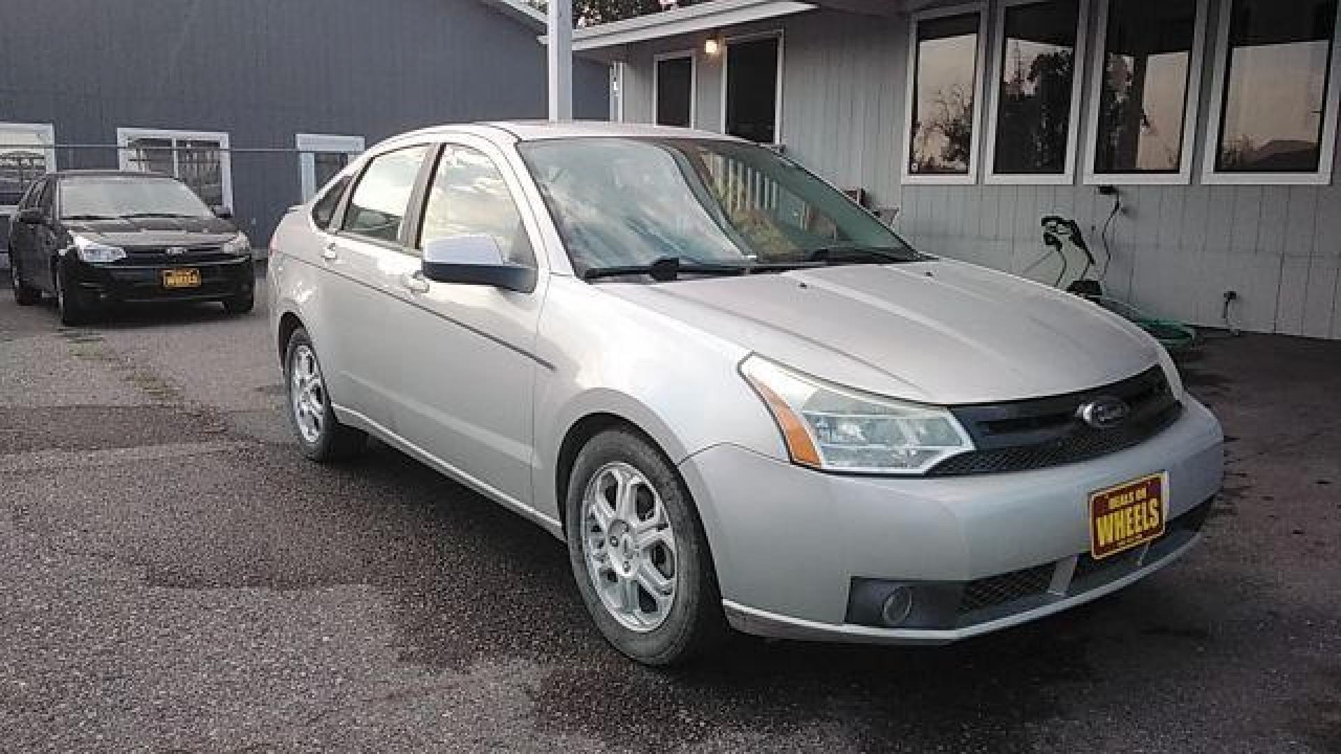 2009 Brilliant Silver Met Ford Focus SES Sedan (1FAHP36N89W) with an 2.0L L4 DOHC 16V engine, located at 1821 N Montana Ave., Helena, MT, 59601, (406) 422-1031, 0.000000, 0.000000 - Photo#2