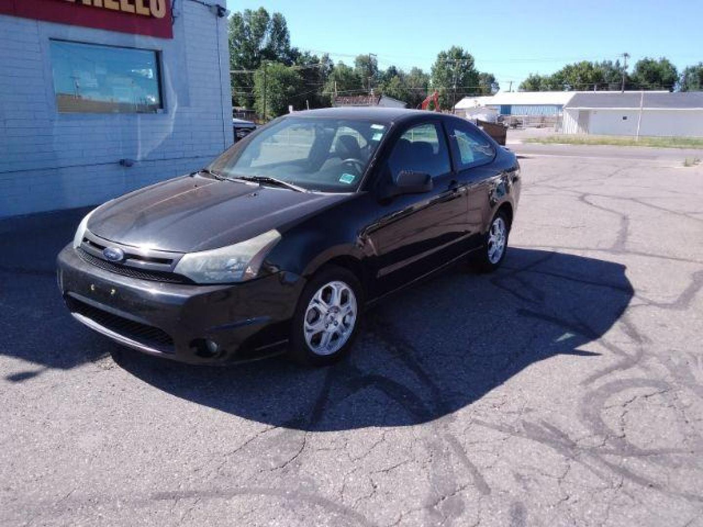 2009 Ford Focus SE Coupe (1FAHP32N69W) with an 2.0L L4 DOHC 16V engine, located at 4801 10th Ave S,, Great Falls, MT, 59405, 0.000000, 0.000000 - Photo#0