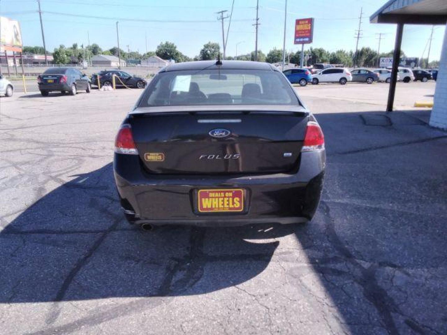 2009 Ford Focus SE Coupe (1FAHP32N69W) with an 2.0L L4 DOHC 16V engine, located at 4801 10th Ave S,, Great Falls, MT, 59405, 0.000000, 0.000000 - Photo#3