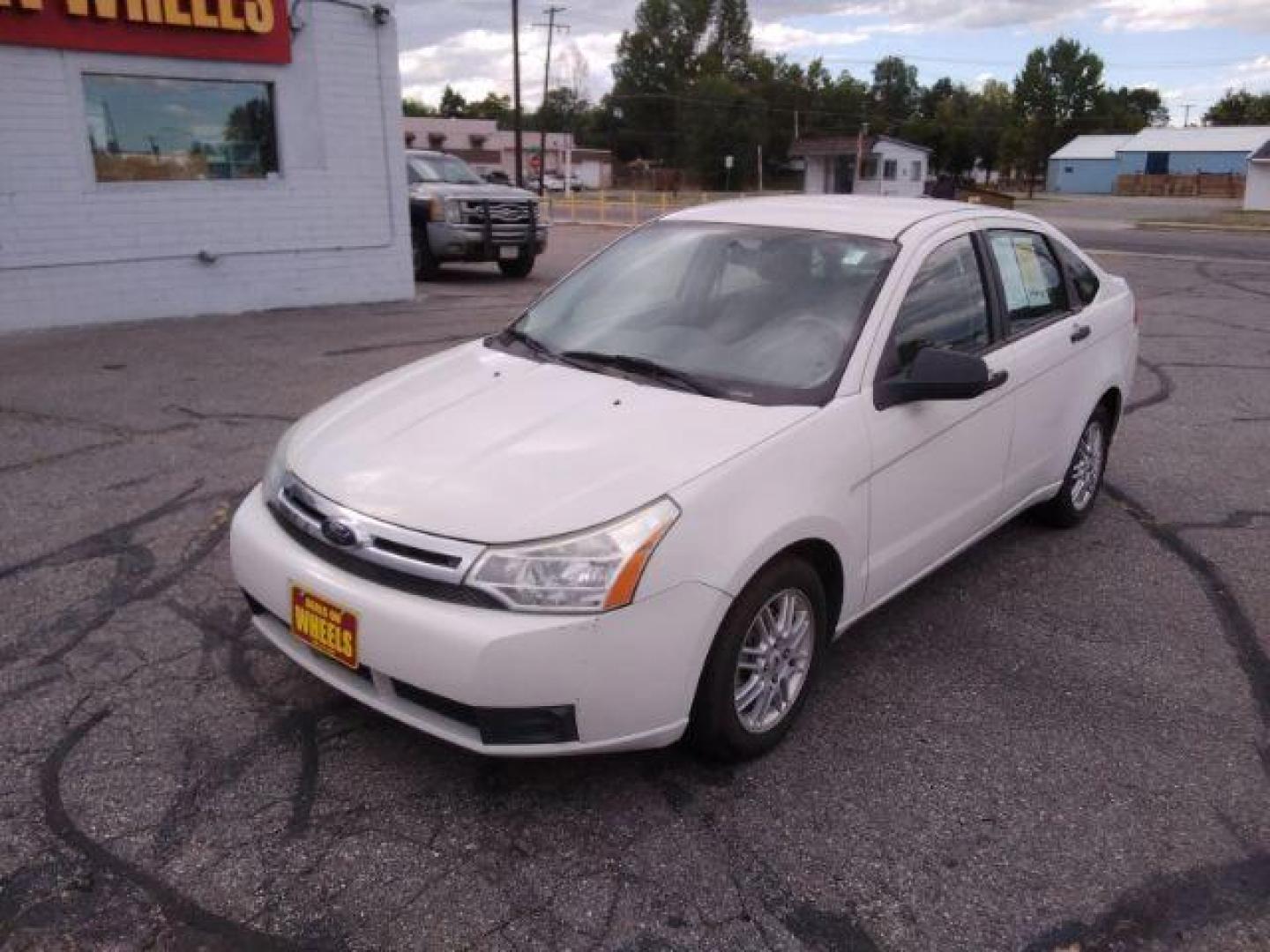 2009 Ford Focus SE Sedan (1FAHP35N29W) with an 2.0L L4 DOHC 16V engine, located at 4047 Montana Ave., Billings, MT, 59101, 45.770847, -108.529800 - Photo#0