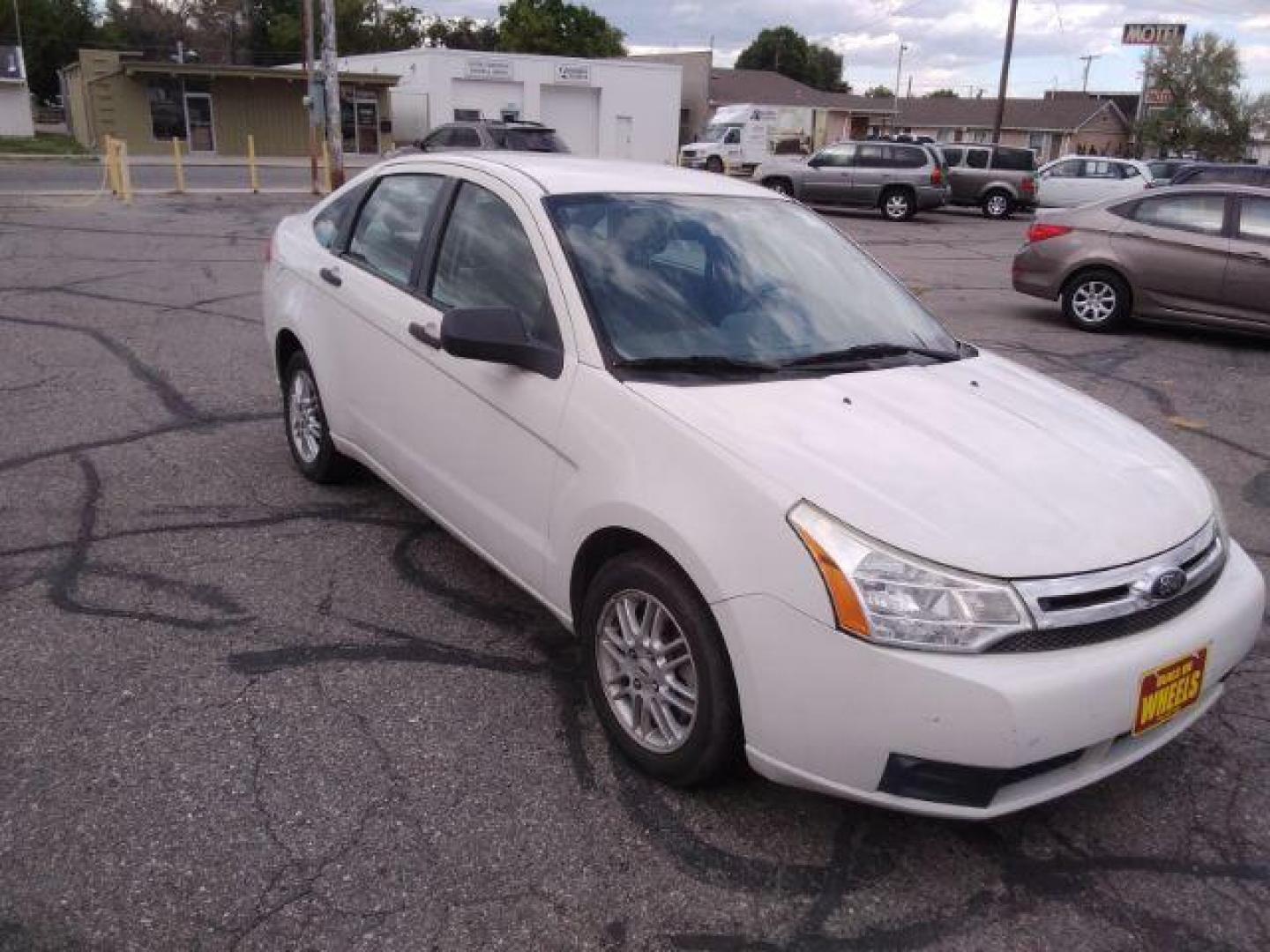 2009 Ford Focus SE Sedan (1FAHP35N29W) with an 2.0L L4 DOHC 16V engine, located at 4047 Montana Ave., Billings, MT, 59101, 45.770847, -108.529800 - Photo#2