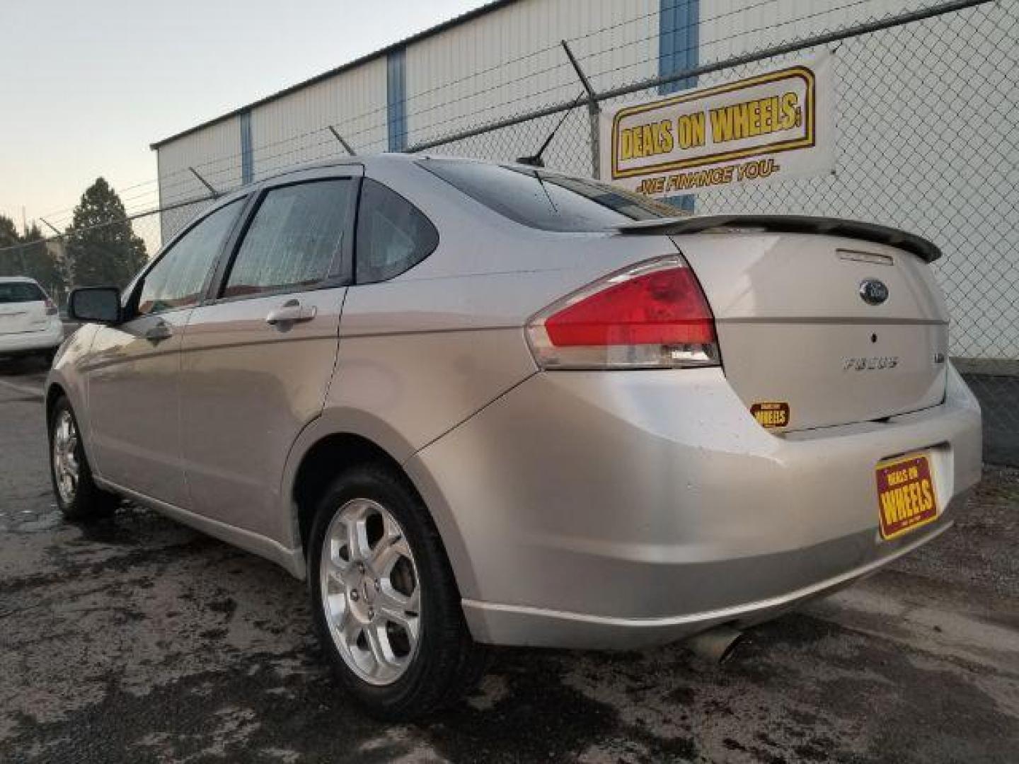 2009 Ford Focus SES Sedan (1FAHP36N99W) with an 2.0L L4 DOHC 16V engine, located at 4047 Montana Ave., Billings, MT, 59101, 45.770847, -108.529800 - Photo#5