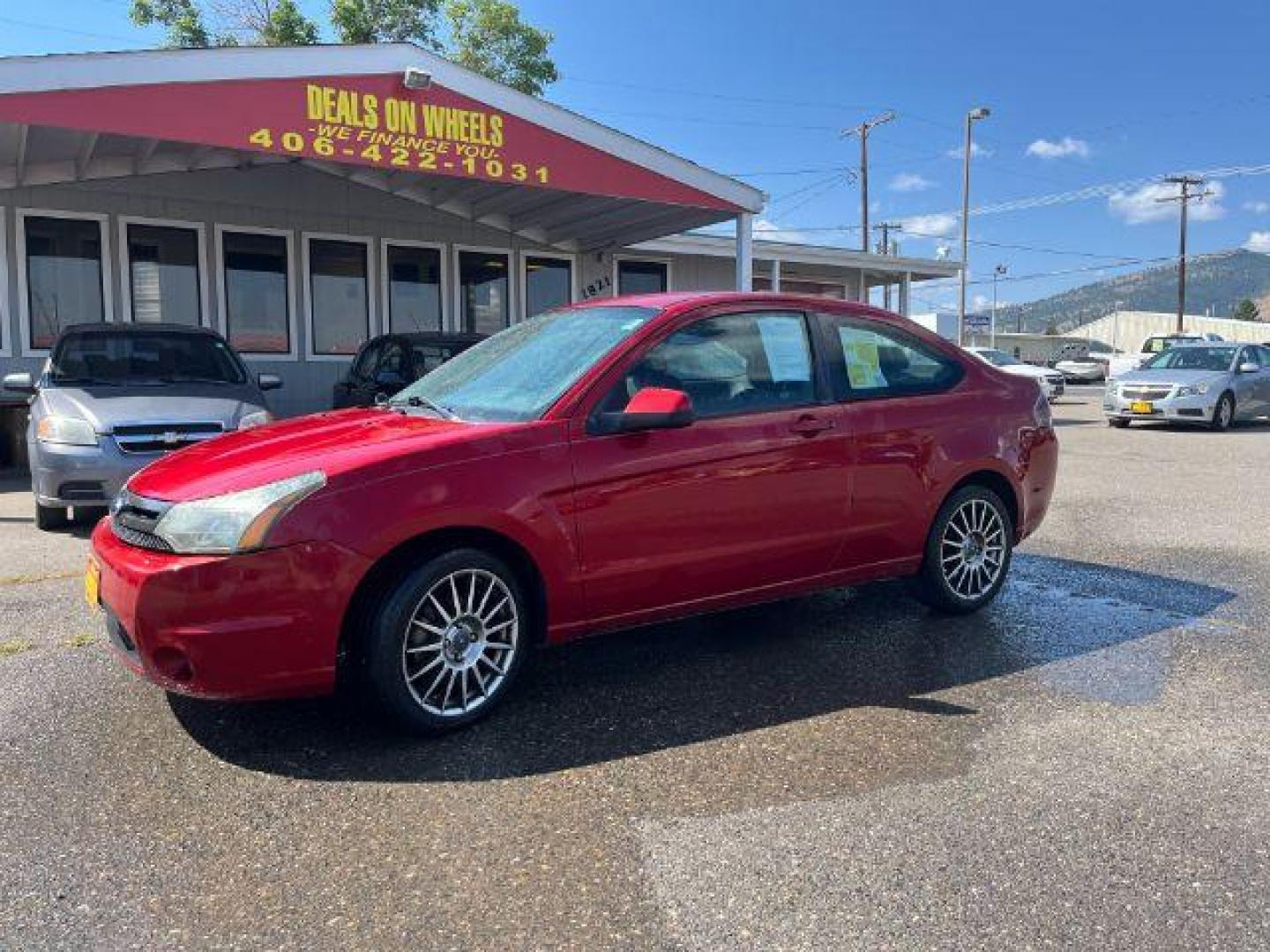 2009 Ford Focus SES Coupe (1FAHP33NX9W) with an 2.0L L4 DOHC 16V engine, located at 1821 N Montana Ave., Helena, MT, 59601, (406) 422-1031, 0.000000, 0.000000 - Photo#0