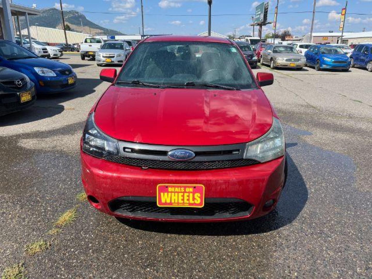 2009 Ford Focus SES Coupe (1FAHP33NX9W) with an 2.0L L4 DOHC 16V engine, located at 1821 N Montana Ave., Helena, MT, 59601, (406) 422-1031, 0.000000, 0.000000 - Photo#1