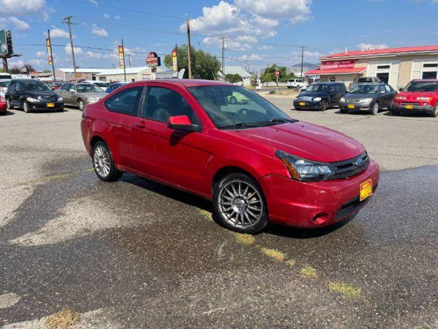 2009 Ford Focus SES Coupe (1FAHP33NX9W) with an 2.0L L4 DOHC 16V engine, located at 1821 N Montana Ave., Helena, MT, 59601, (406) 422-1031, 0.000000, 0.000000 - Photo#2