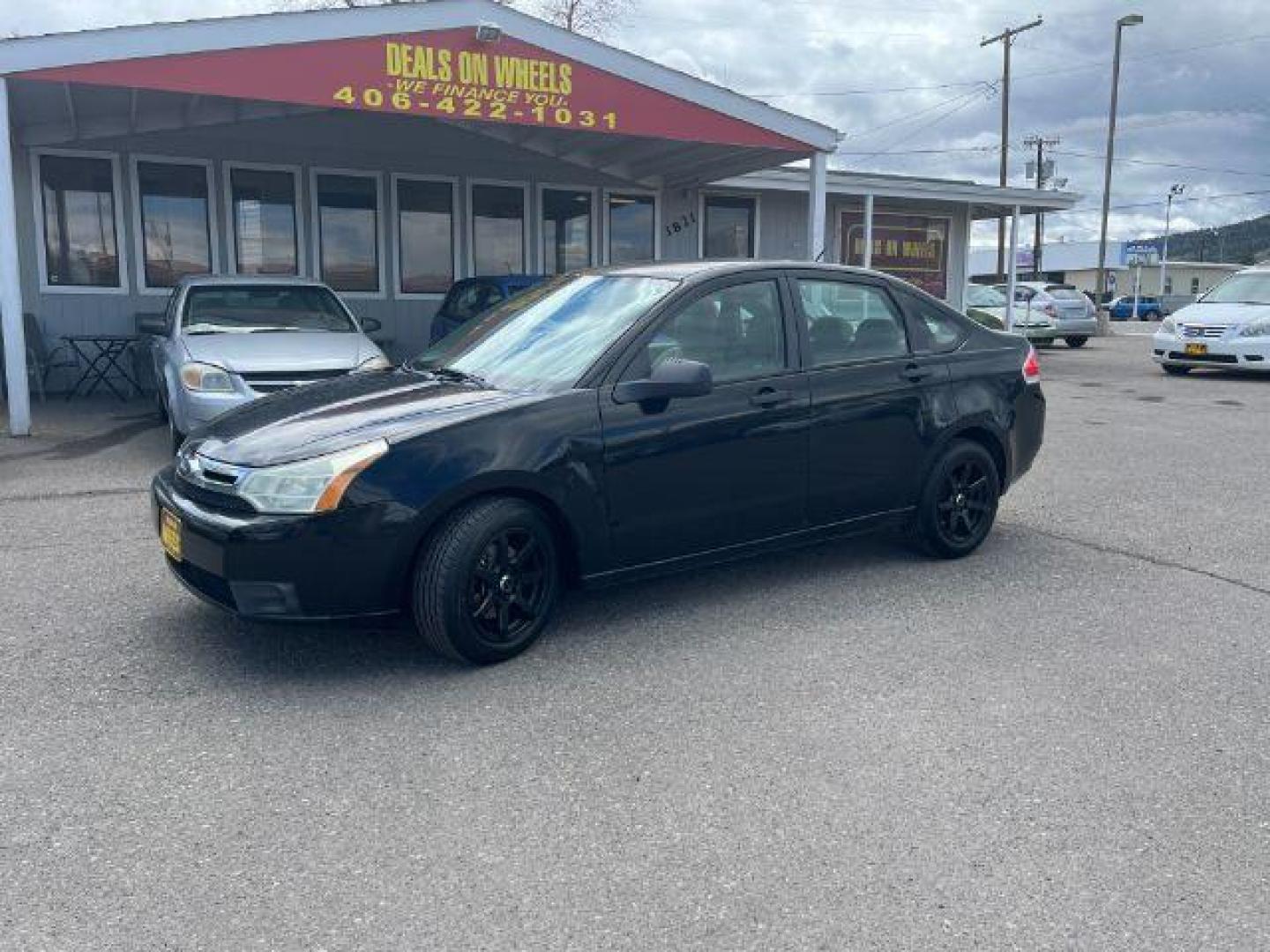 2009 Ford Focus SE Sedan (1FAHP35N99W) with an 2.0L L4 DOHC 16V engine, located at 1821 N Montana Ave., Helena, MT, 59601, (406) 422-1031, 0.000000, 0.000000 - Photo#0