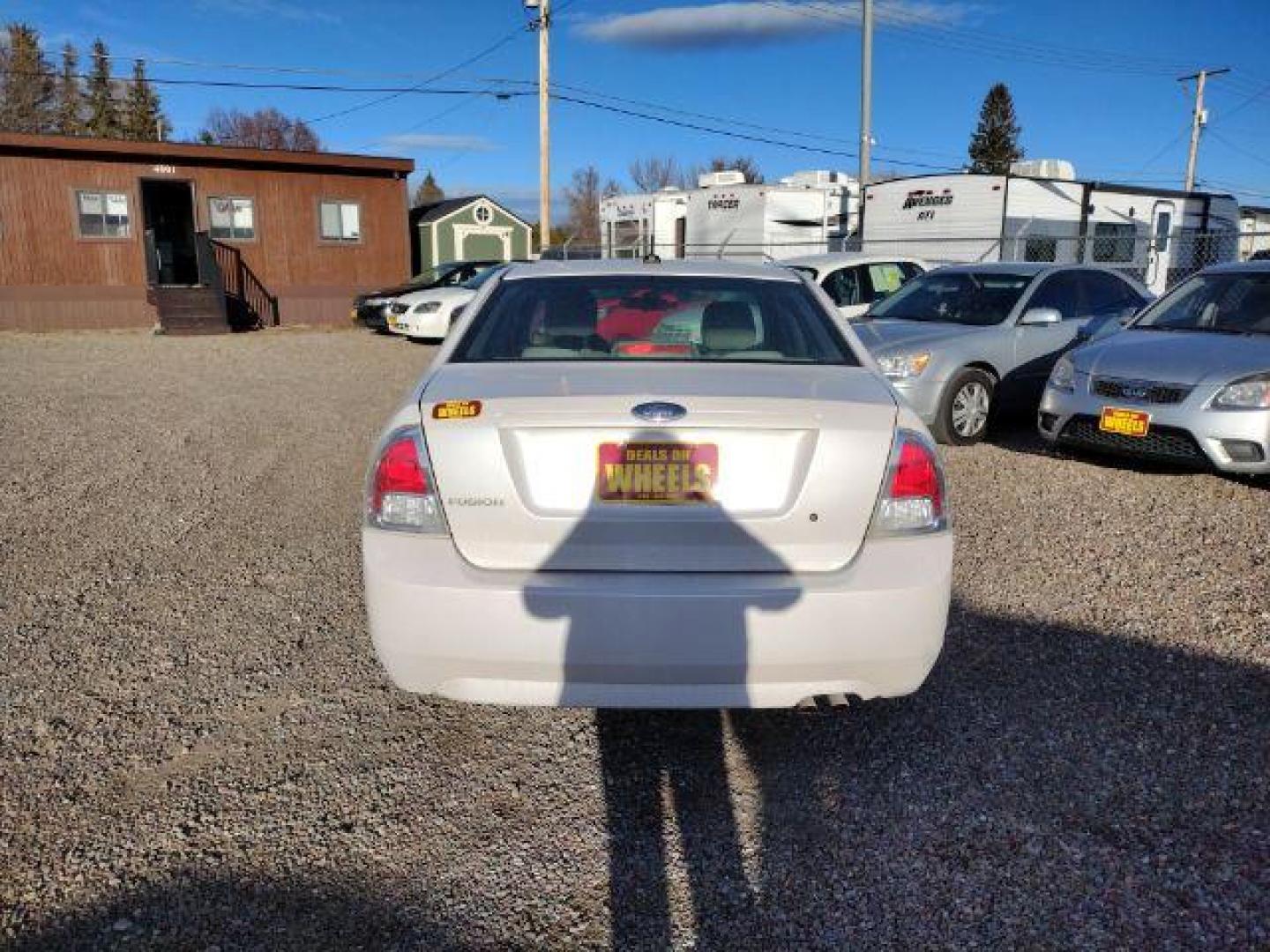 2009 Ford Fusion I4 S (3FAHP06Z19R) with an 2.3L L4 DOHC 16V engine, located at 4801 10th Ave S,, Great Falls, MT, 59405, 0.000000, 0.000000 - Photo#3