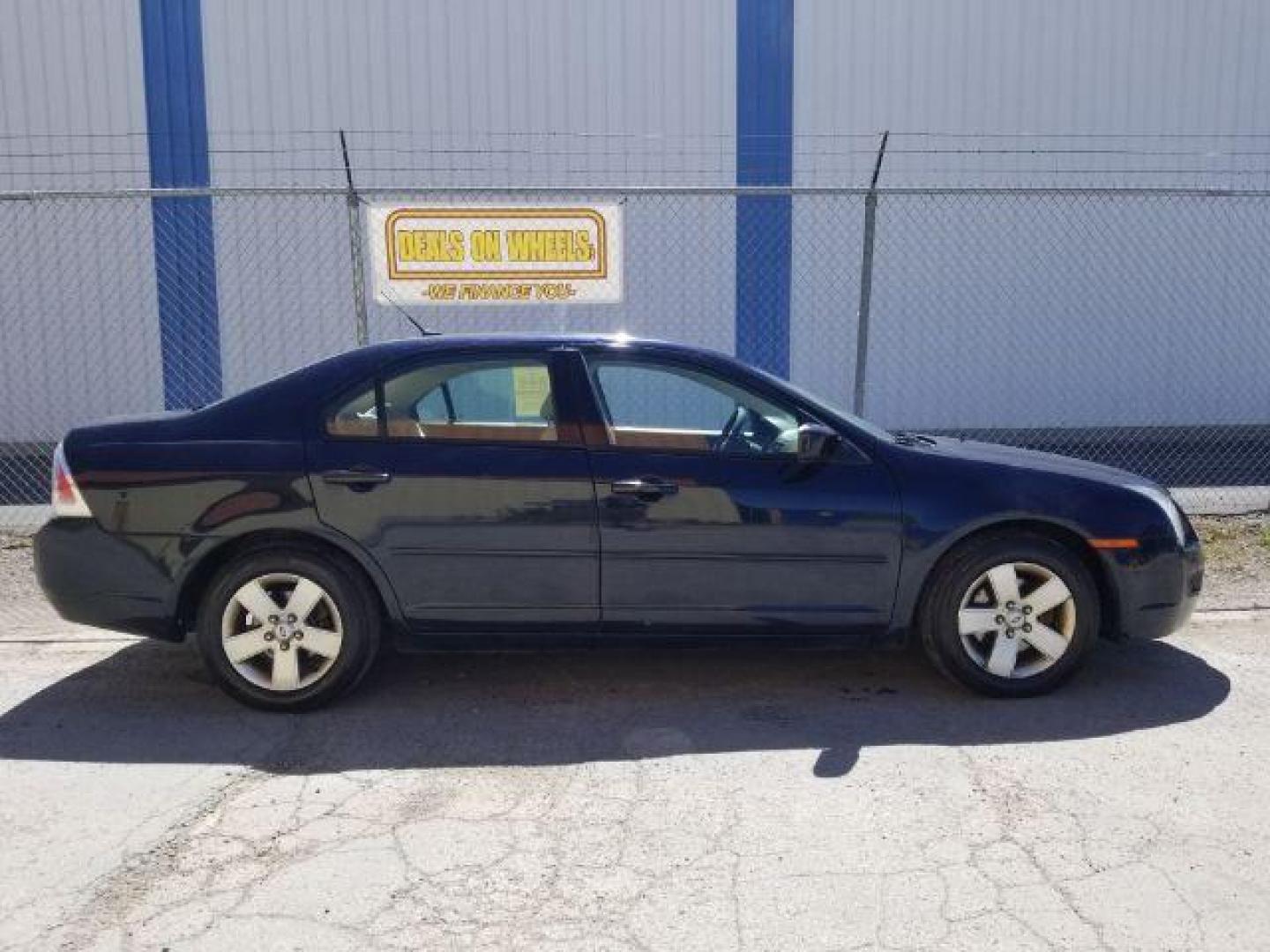 2009 Ford Fusion I4 SE (3FAHP07Z89R) with an 2.3L L4 DOHC 16V engine, located at 4801 10th Ave S,, Great Falls, MT, 59405, 0.000000, 0.000000 - Photo#5