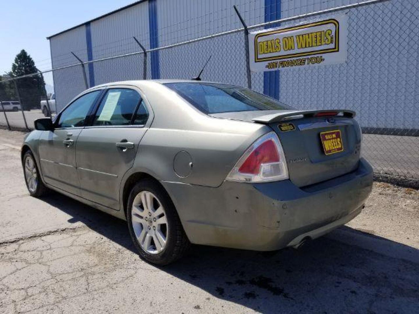 2009 Ford Fusion V6 SEL AWD (3FAHP02119R) with an 3.0L V6 DOHC 24V engine, located at 601 E. Idaho St., Kalispell, MT, 59901, 0.000000, 0.000000 - Photo#3