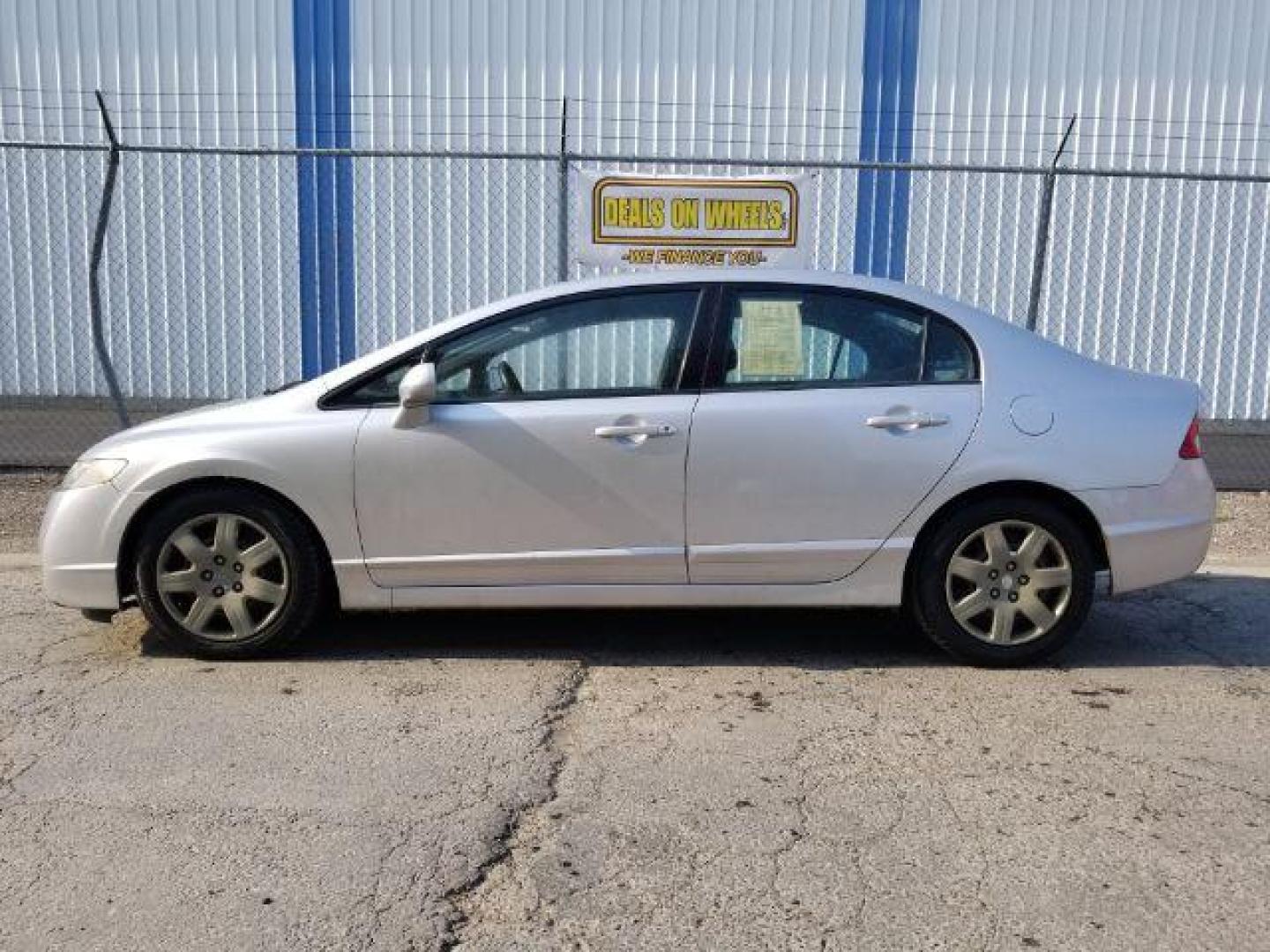 2009 Honda Civic LX Sedan 5-Speed AT (2HGFA16519H) with an 1.8L L4 SOHC 16V engine, 5-Speed Automatic transmission, located at 1800 West Broadway, Missoula, 59808, (406) 543-1986, 46.881348, -114.023628 - Photo#9