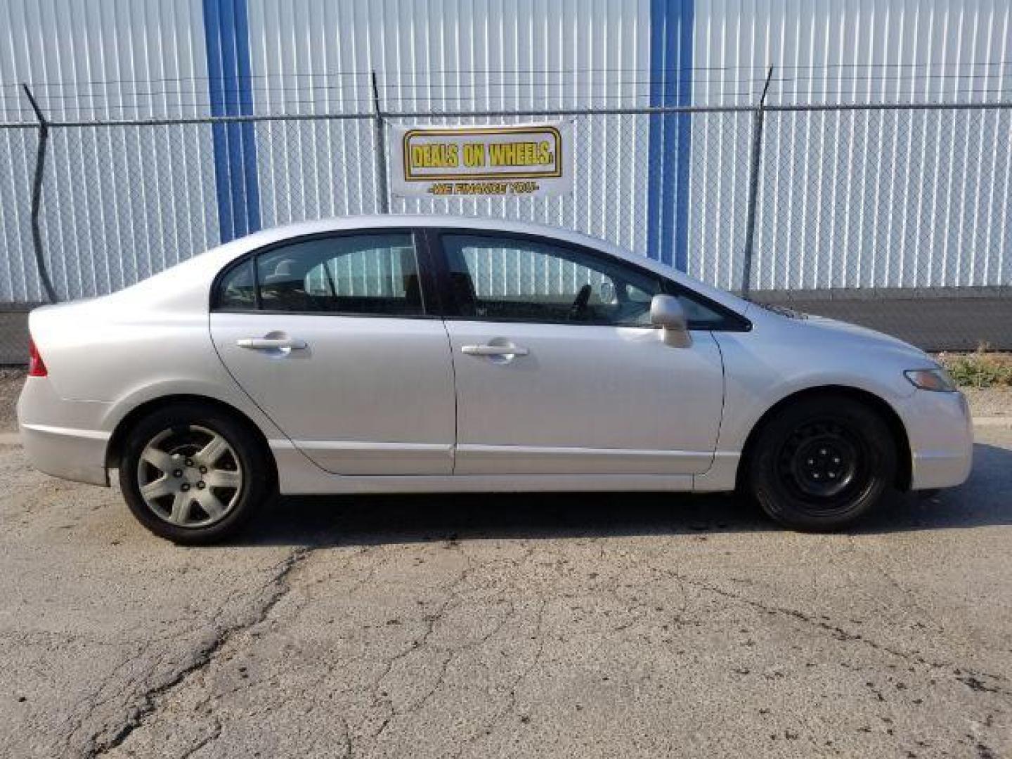 2009 Honda Civic LX Sedan 5-Speed AT (2HGFA16519H) with an 1.8L L4 SOHC 16V engine, 5-Speed Automatic transmission, located at 1800 West Broadway, Missoula, 59808, (406) 543-1986, 46.881348, -114.023628 - Photo#5