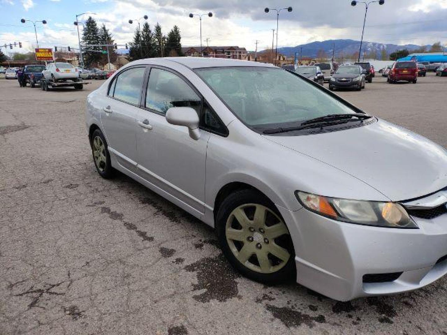 2009 Honda Civic LX Sedan 5-Speed AT (2HGFA16519H) with an 1.8L L4 SOHC 16V engine, 5-Speed Automatic transmission, located at 1800 West Broadway, Missoula, 59808, (406) 543-1986, 46.881348, -114.023628 - Photo#2