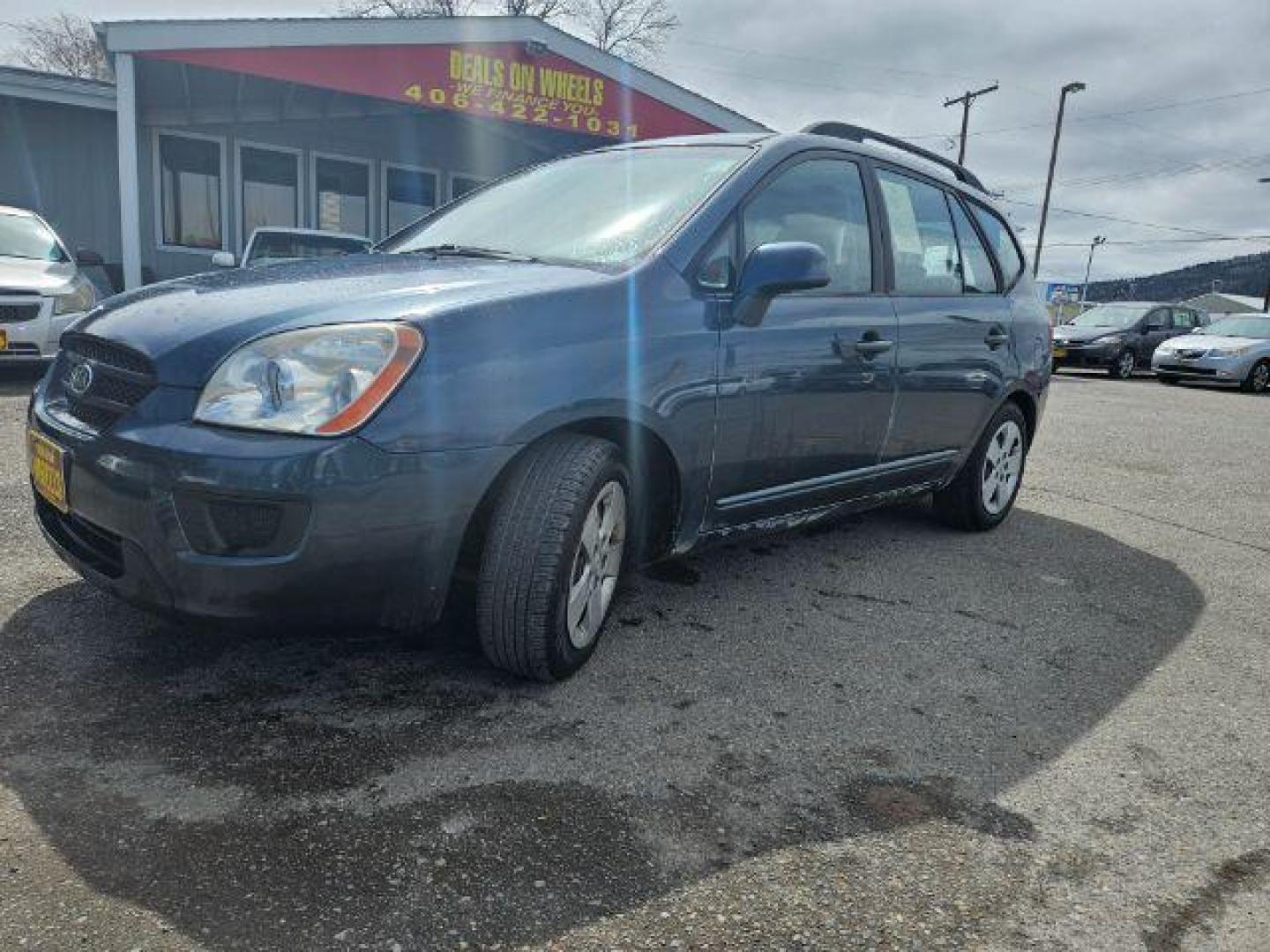 2009 Kia Rondo LX (KNAFG529097) with an 2.4L L4 DOHC 16V engine, 4-Speed Automatic transmission, located at 1821 N Montana Ave., Helena, MT, 59601, (406) 422-1031, 0.000000, 0.000000 - Photo#0