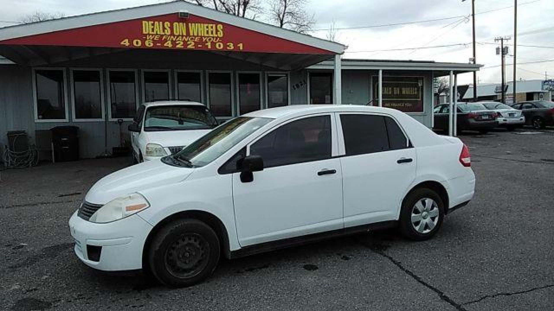 2009 Fresh Powder Nissan Versa 1.6 Base Sedan (3N1CC11E29L) with an 1.6L L4 DOHC 16V engine, located at 1821 N Montana Ave., Helena, MT, 59601, (406) 422-1031, 0.000000, 0.000000 - Photo#0