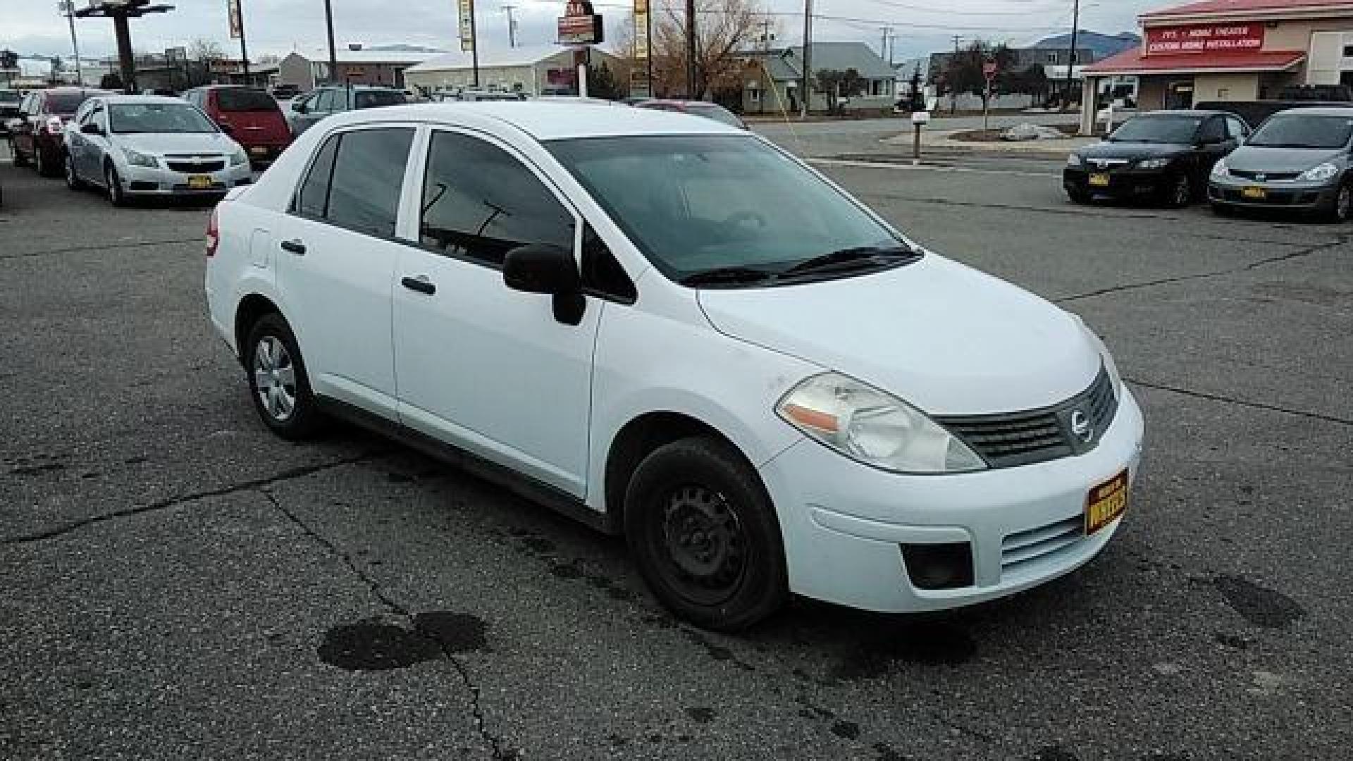 2009 Fresh Powder Nissan Versa 1.6 Base Sedan (3N1CC11E29L) with an 1.6L L4 DOHC 16V engine, located at 1821 N Montana Ave., Helena, MT, 59601, (406) 422-1031, 0.000000, 0.000000 - Photo#2