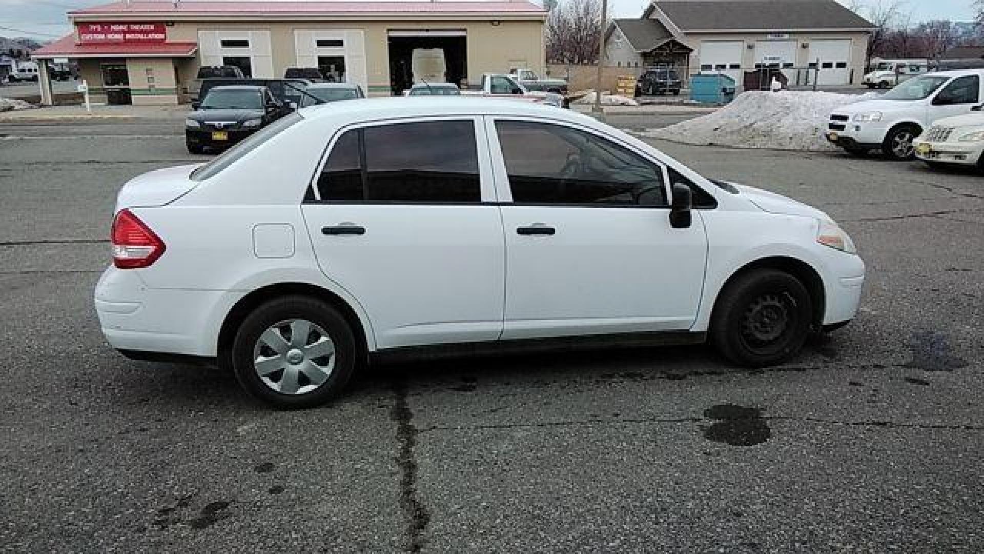 2009 Fresh Powder Nissan Versa 1.6 Base Sedan (3N1CC11E29L) with an 1.6L L4 DOHC 16V engine, located at 1821 N Montana Ave., Helena, MT, 59601, (406) 422-1031, 0.000000, 0.000000 - Photo#3