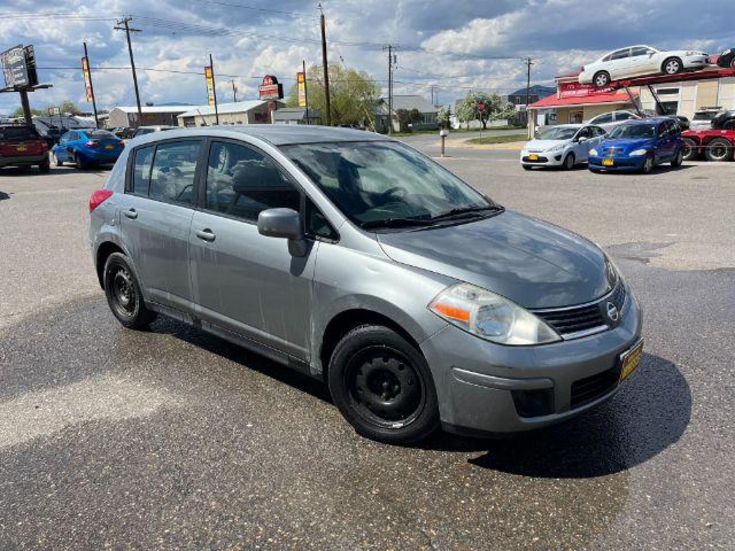 2009 Nissan Versa 1.8 S Hatchback (3N1BC13EX9L) with an 1.8L L4 DOHC 16V engine, located at 1821 N Montana Ave., Helena, MT, 59601, (406) 422-1031, 0.000000, 0.000000 - Photo#1