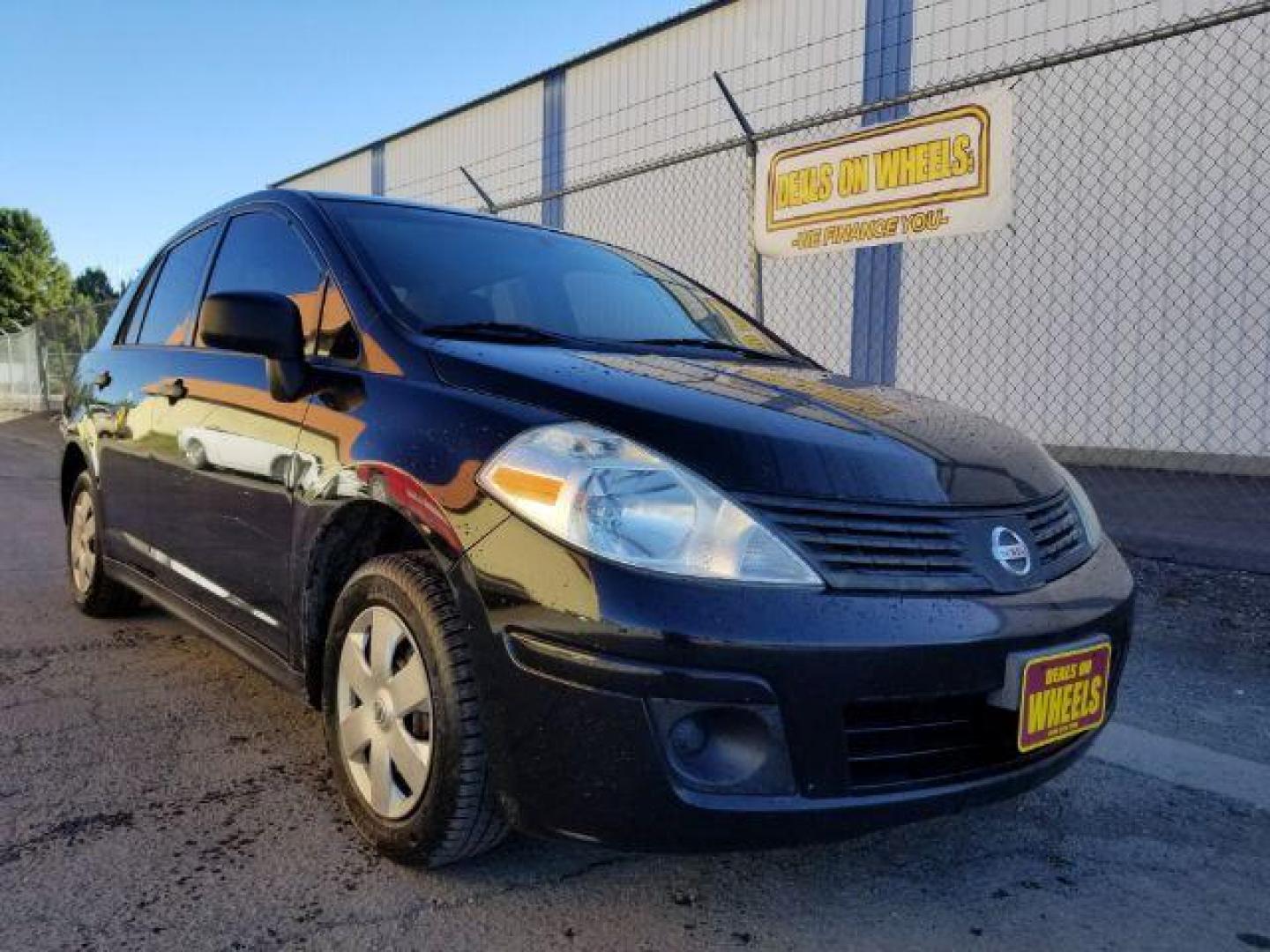 2009 Nissan Versa 1.6 Base Sedan (3N1CC11E79L) with an 1.6L L4 DOHC 16V engine, 5-Speed Manual transmission, located at 601 E. Idaho St., Kalispell, MT, 59901, 0.000000, 0.000000 - Photo#6