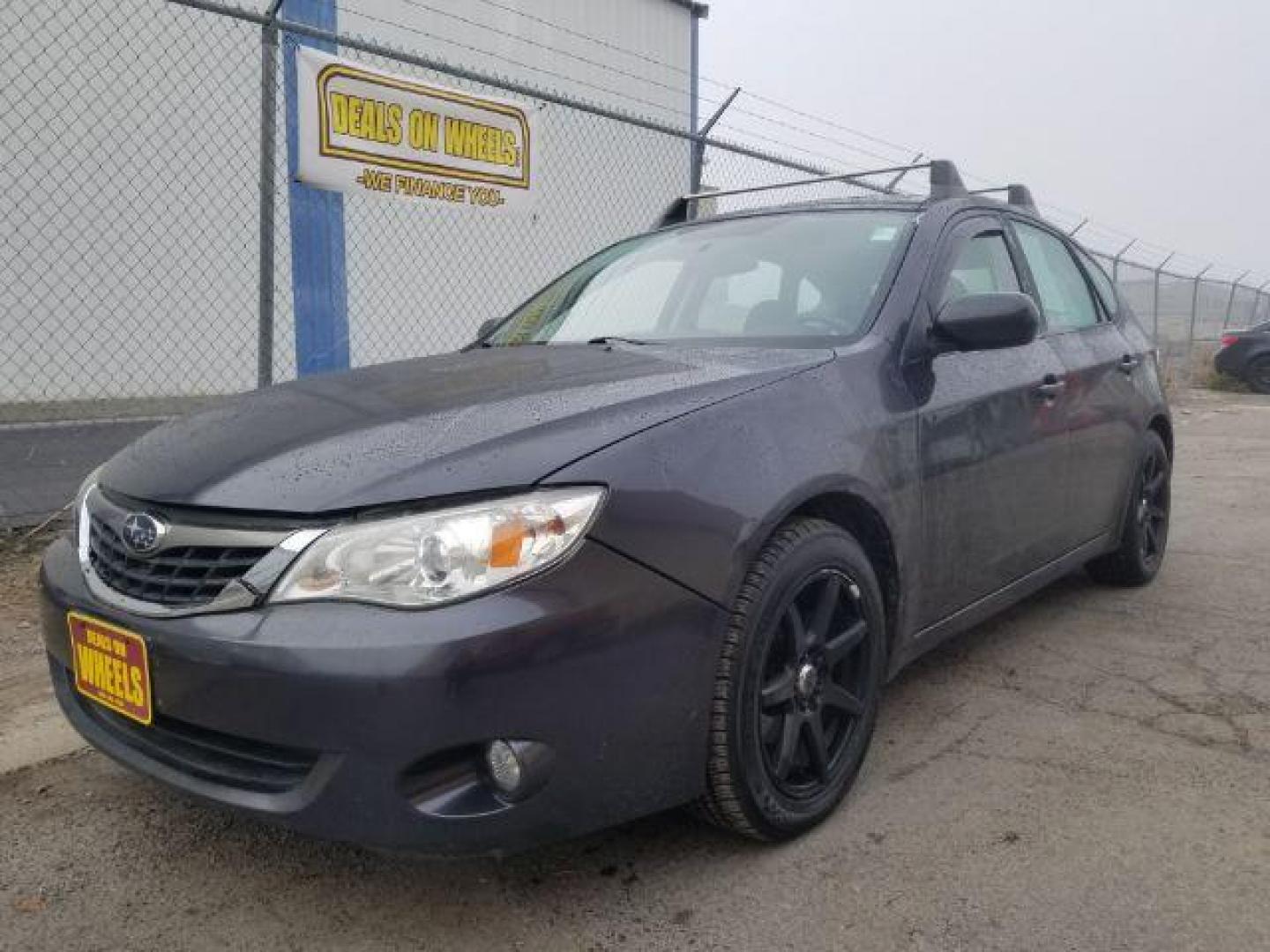 2009 Subaru Impreza 2.5i Premium 5-Door (JF1GH60679H) with an 2.5L H4 SOHC 16V engine, located at 601 E. Idaho St., Kalispell, MT, 59901, 0.000000, 0.000000 - Photo#0