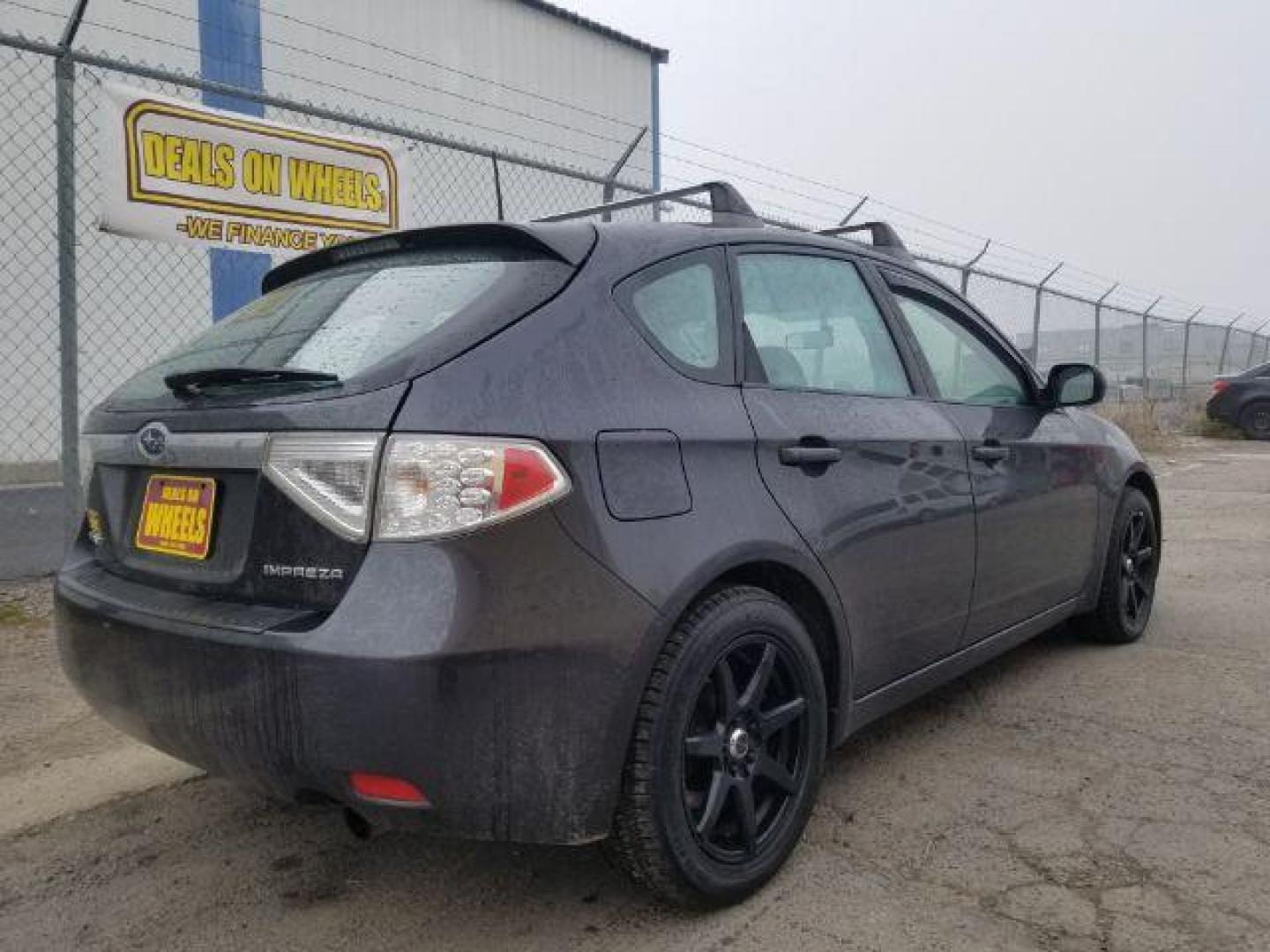 2009 Subaru Impreza 2.5i Premium 5-Door (JF1GH60679H) with an 2.5L H4 SOHC 16V engine, located at 601 E. Idaho St., Kalispell, MT, 59901, 0.000000, 0.000000 - Photo#4