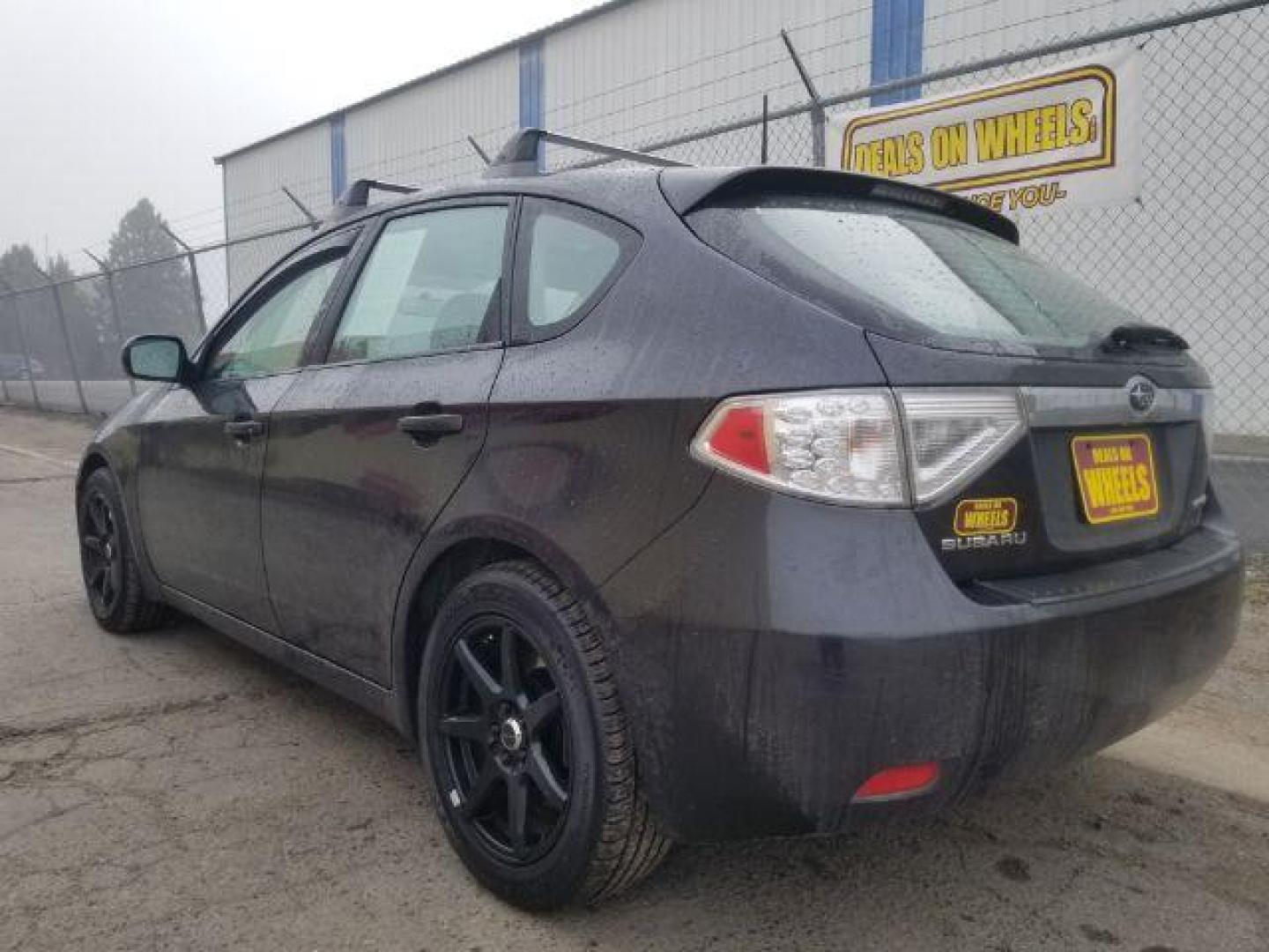 2009 Subaru Impreza 2.5i Premium 5-Door (JF1GH60679H) with an 2.5L H4 SOHC 16V engine, located at 601 E. Idaho St., Kalispell, MT, 59901, 0.000000, 0.000000 - Photo#5